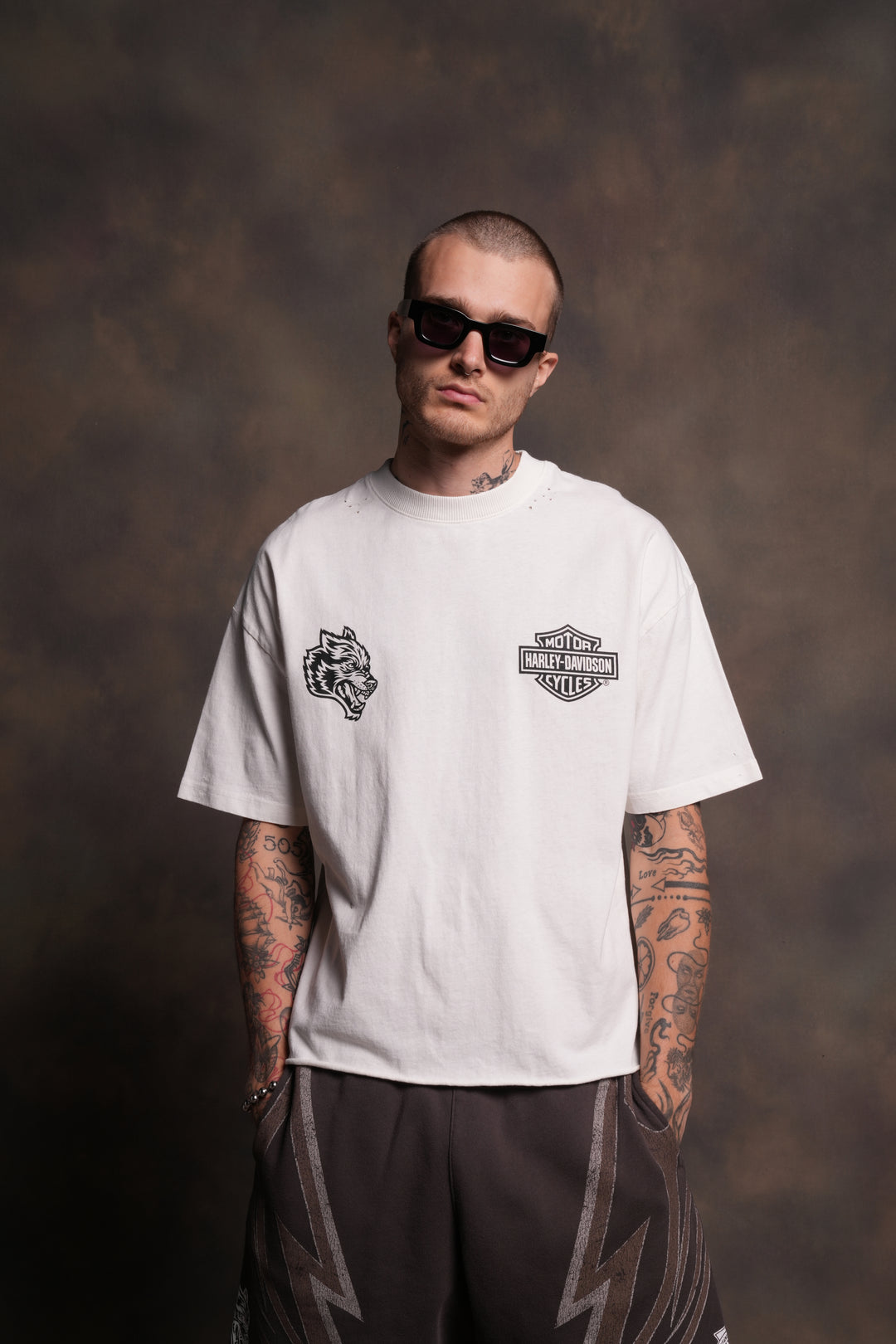 Harley-Davidson Wolves Distressed Grunge Mid-Length Raw Hem Tee in Cream