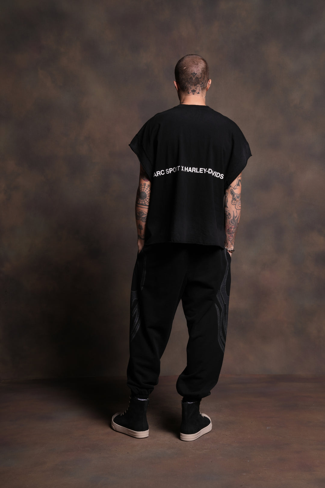 Inferno Shield Grunge Cut-Off Mid-Length Raw Hem Tee in Black Drift Wash