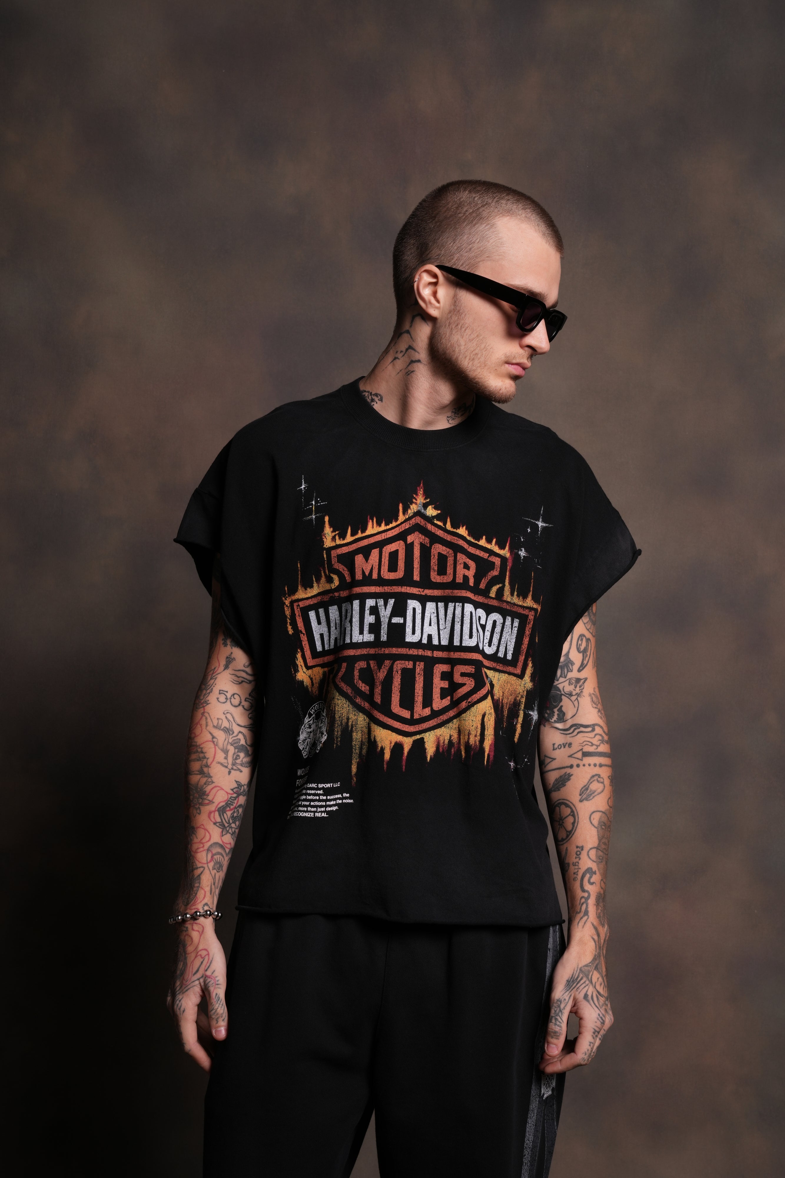 Inferno Shield Grunge Cut-Off Mid-Length Raw Hem Tee in Black Drift Wash