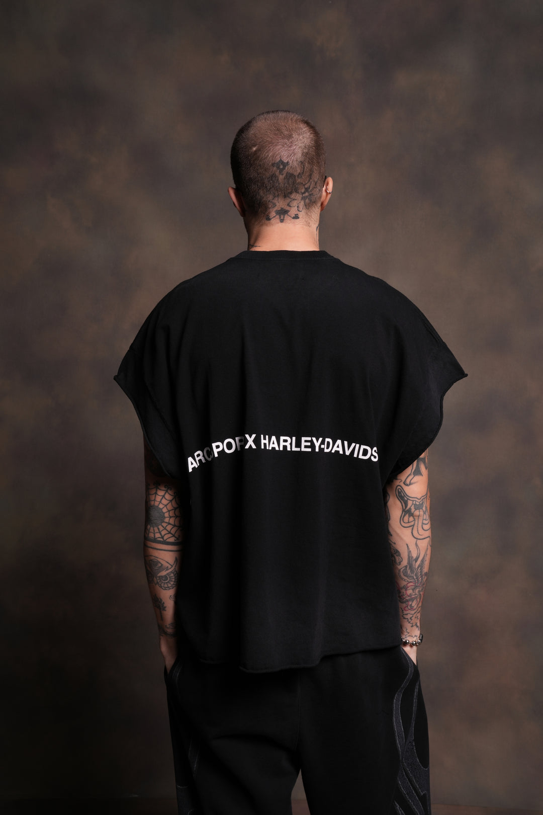 Inferno Shield Grunge Cut-Off Mid-Length Raw Hem Tee in Black Drift Wash