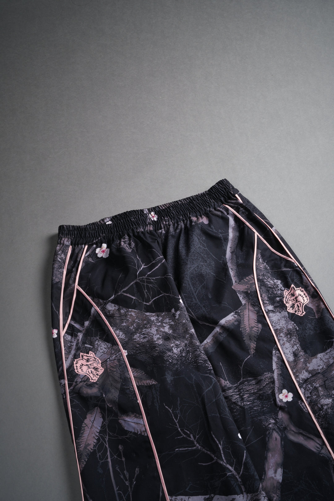 Dual Wolf Quinn Track Pants in Darc Blossom Woodland Camo/Cherry Blossom