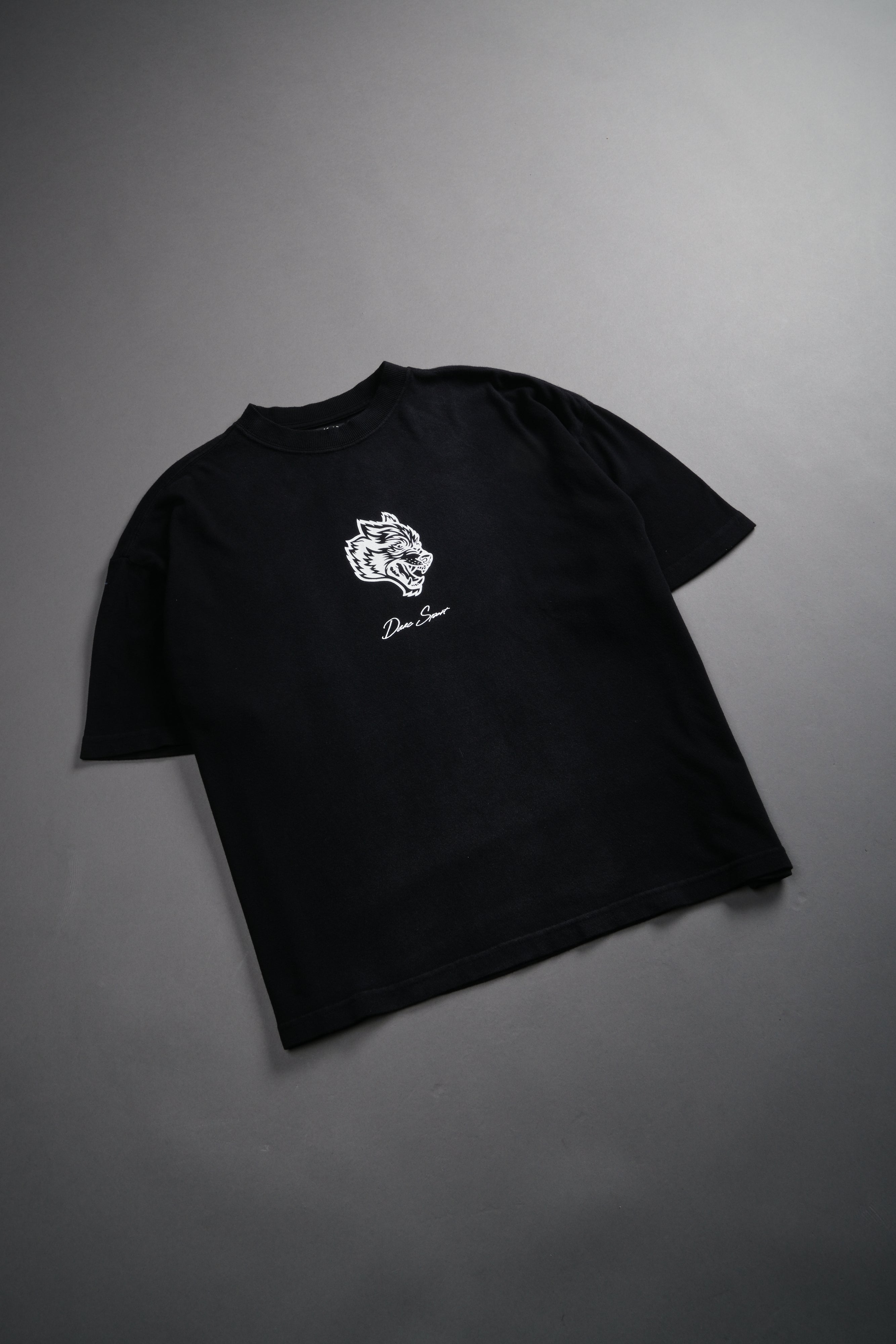 Our Wolf Forever Box Cut "Pump Cover" Tee in Black Spine Sun Fade