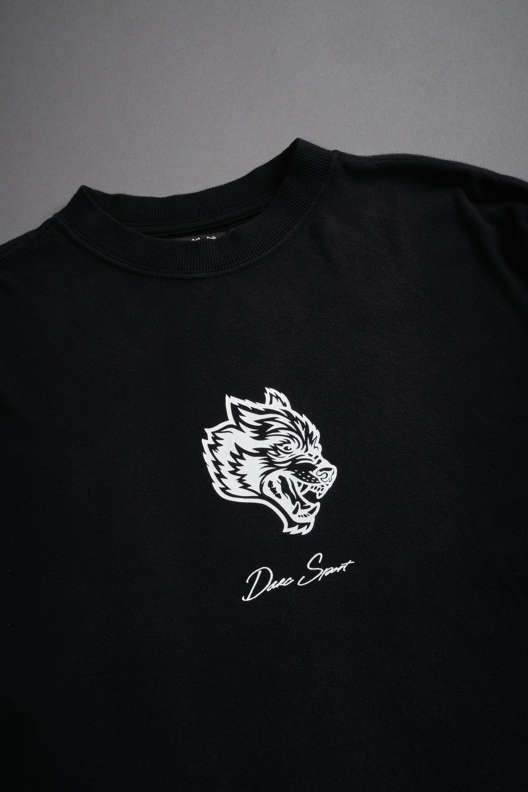 Our Wolf Forever Box Cut "Pump Cover" Tee in Black Spine Sun Fade