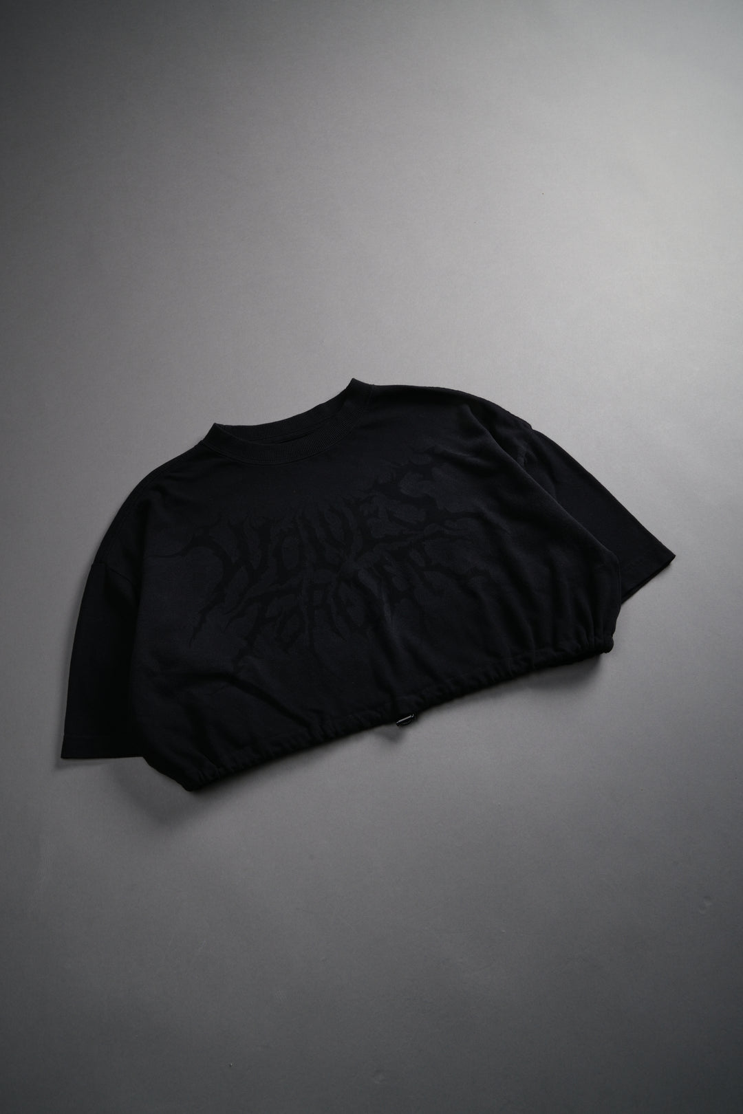 Forged From Iron Bungee Cropped Tee in Black Horizon Sun Fade