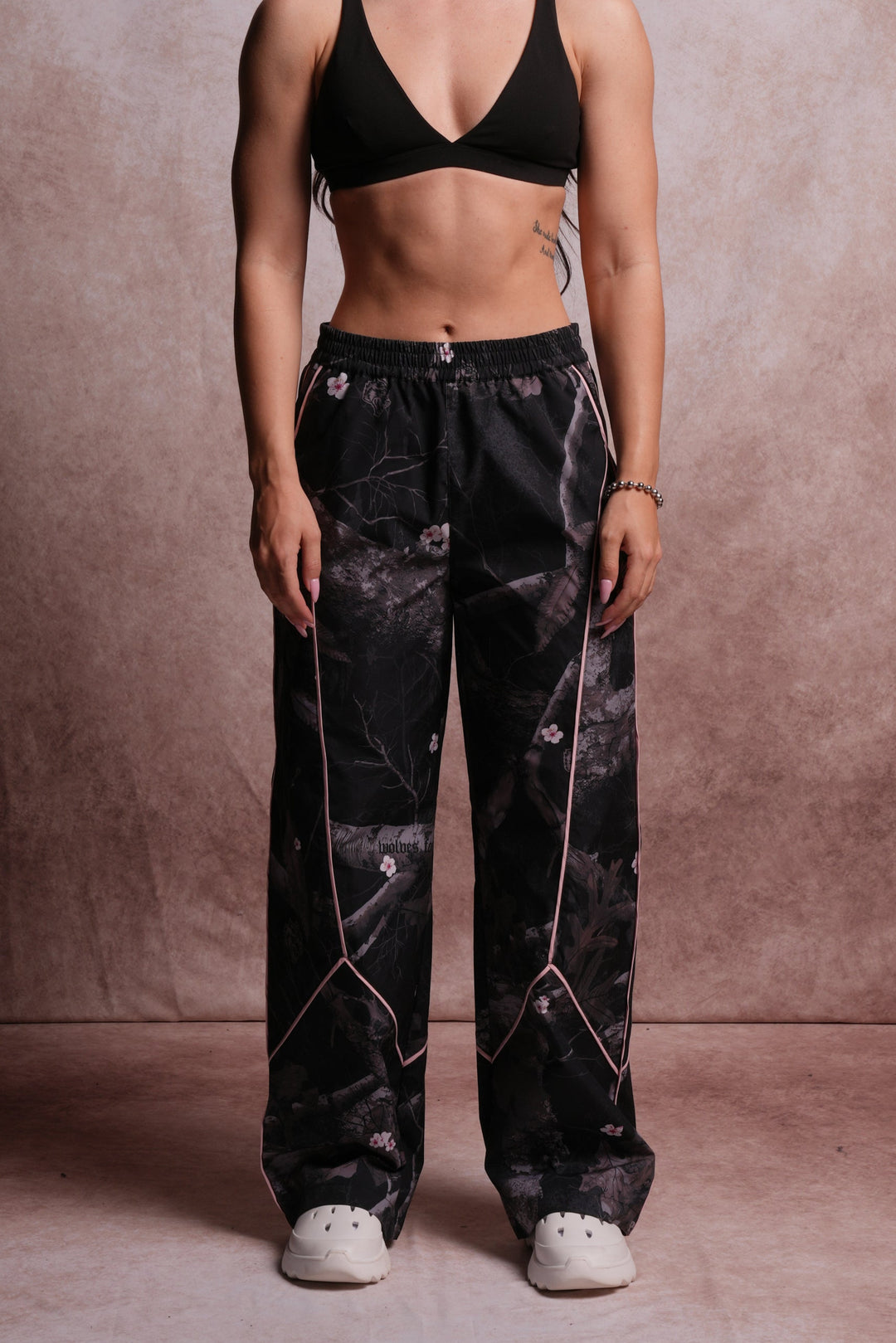 Dual Wolf Quinn Track Pants in Darc Blossom Woodland Camo/Cherry Blossom