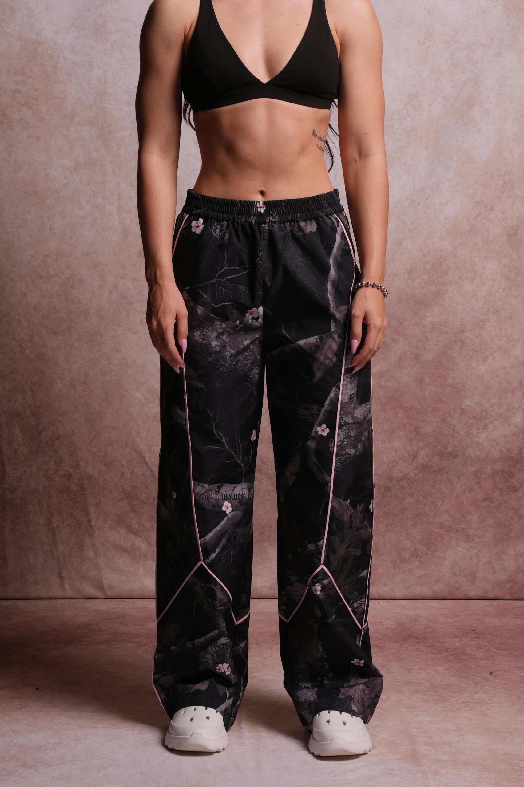 Dual Wolf Quinn Track Pants in Darc Blossom Woodland Camo/Cherry Blossom