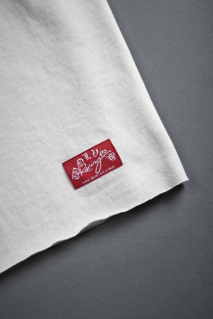 Darc Racer Grunge Mid Length Raw Hem Tee in Cream
