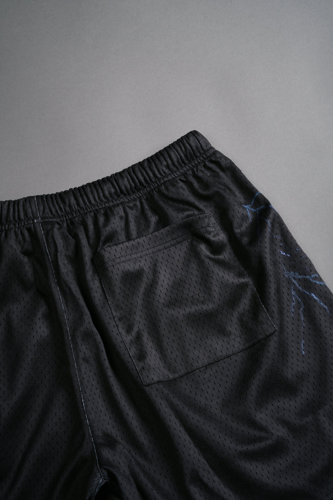 Eye Of The Beast Mesh Shorts in Black