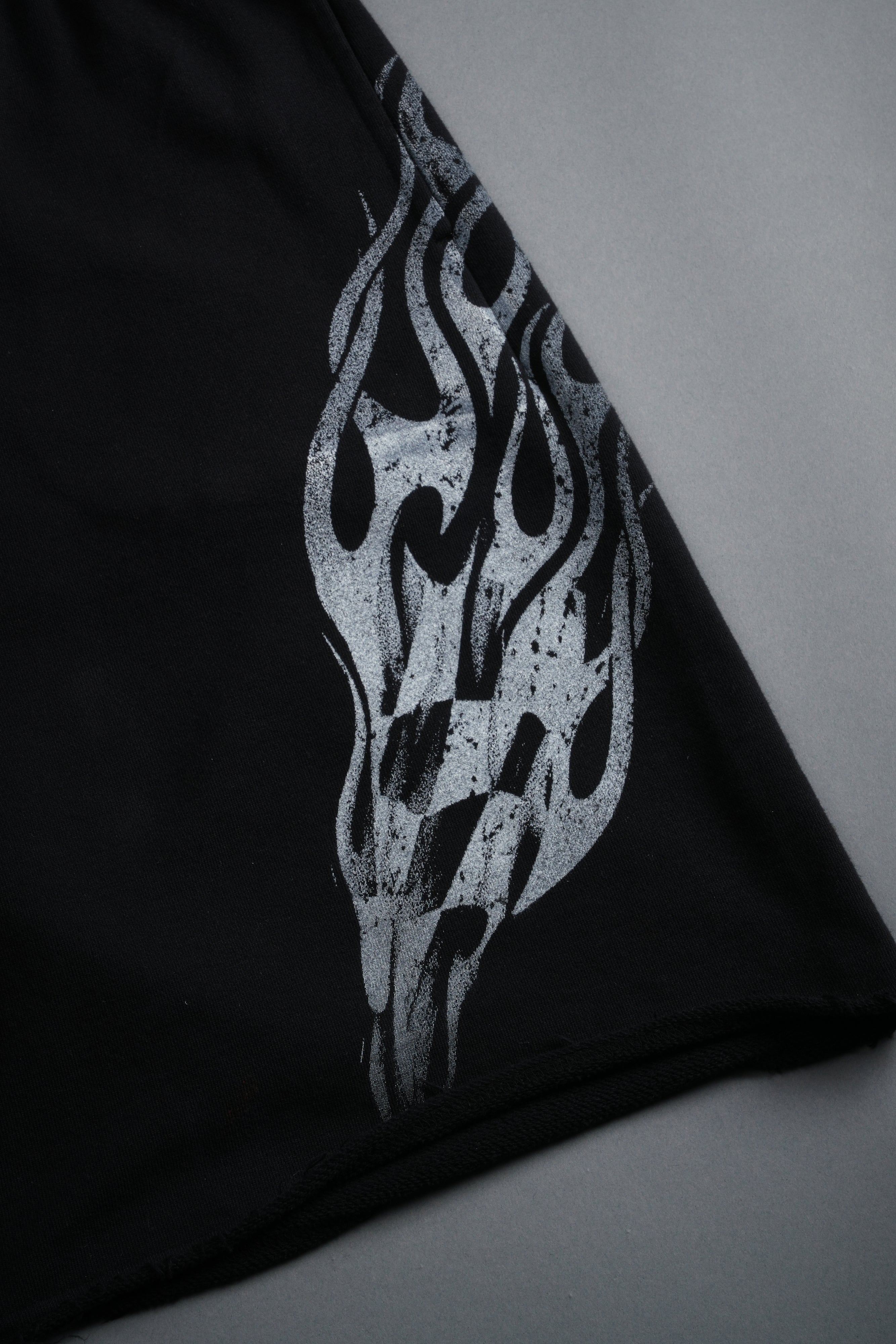 Race Inferno Grunge Oversized Raw Hem Post Lounge Sweat Shorts in Black