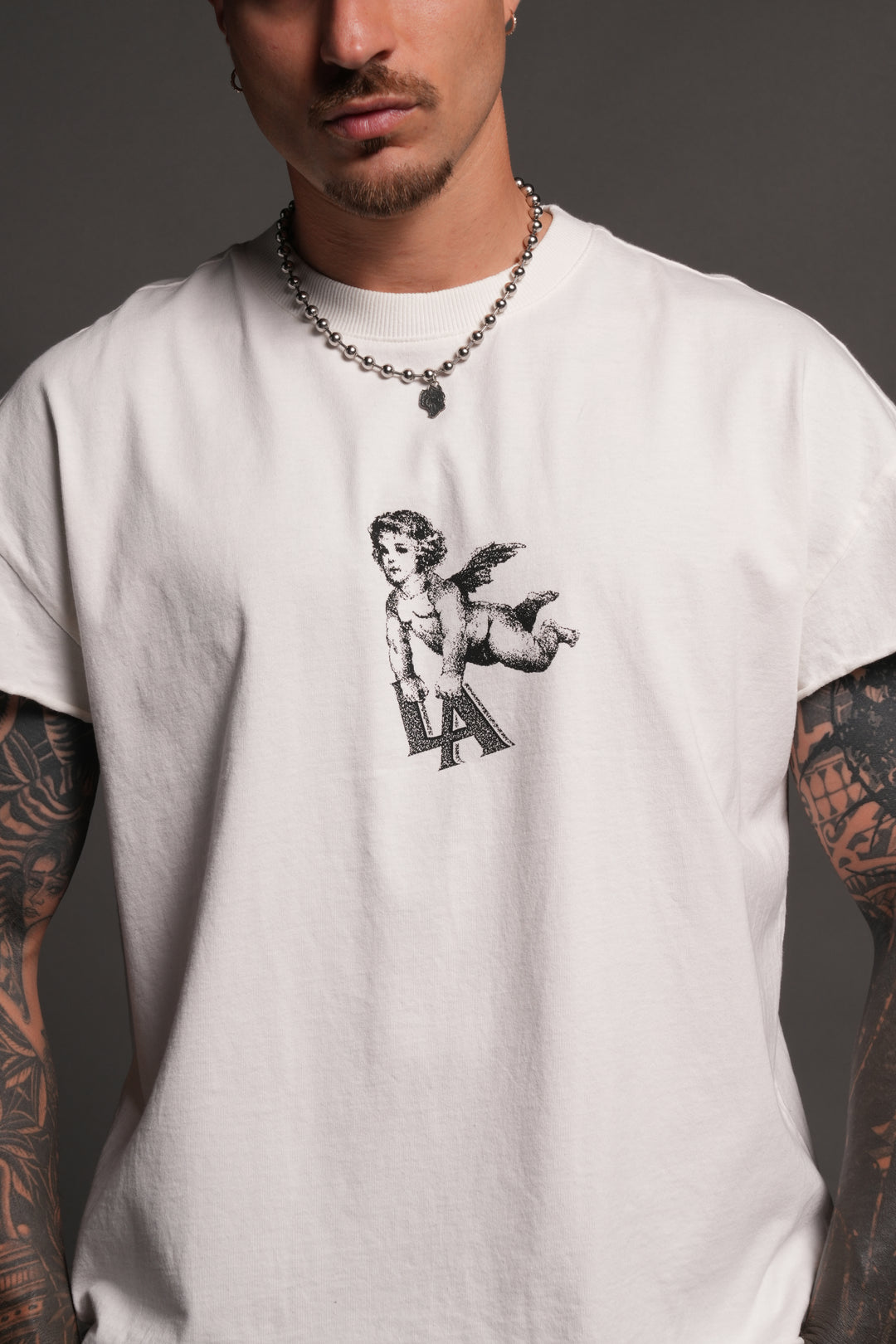 La Cherub Grunge Mid Length Raw Hem Cap Sleeve Tee in Cream