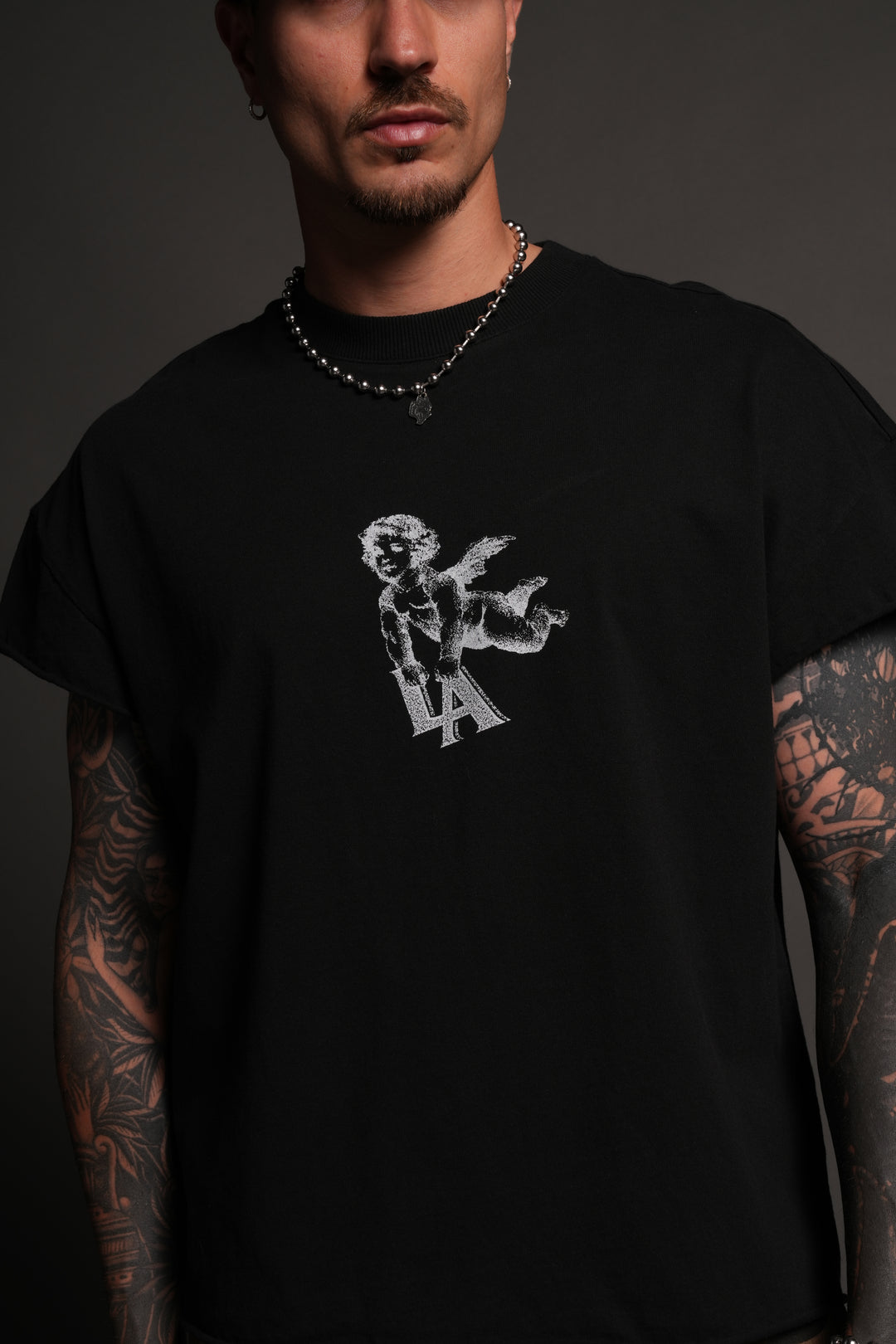 La Cherub Grunge Mid Length Raw Hem Cap Sleeve Tee in Black