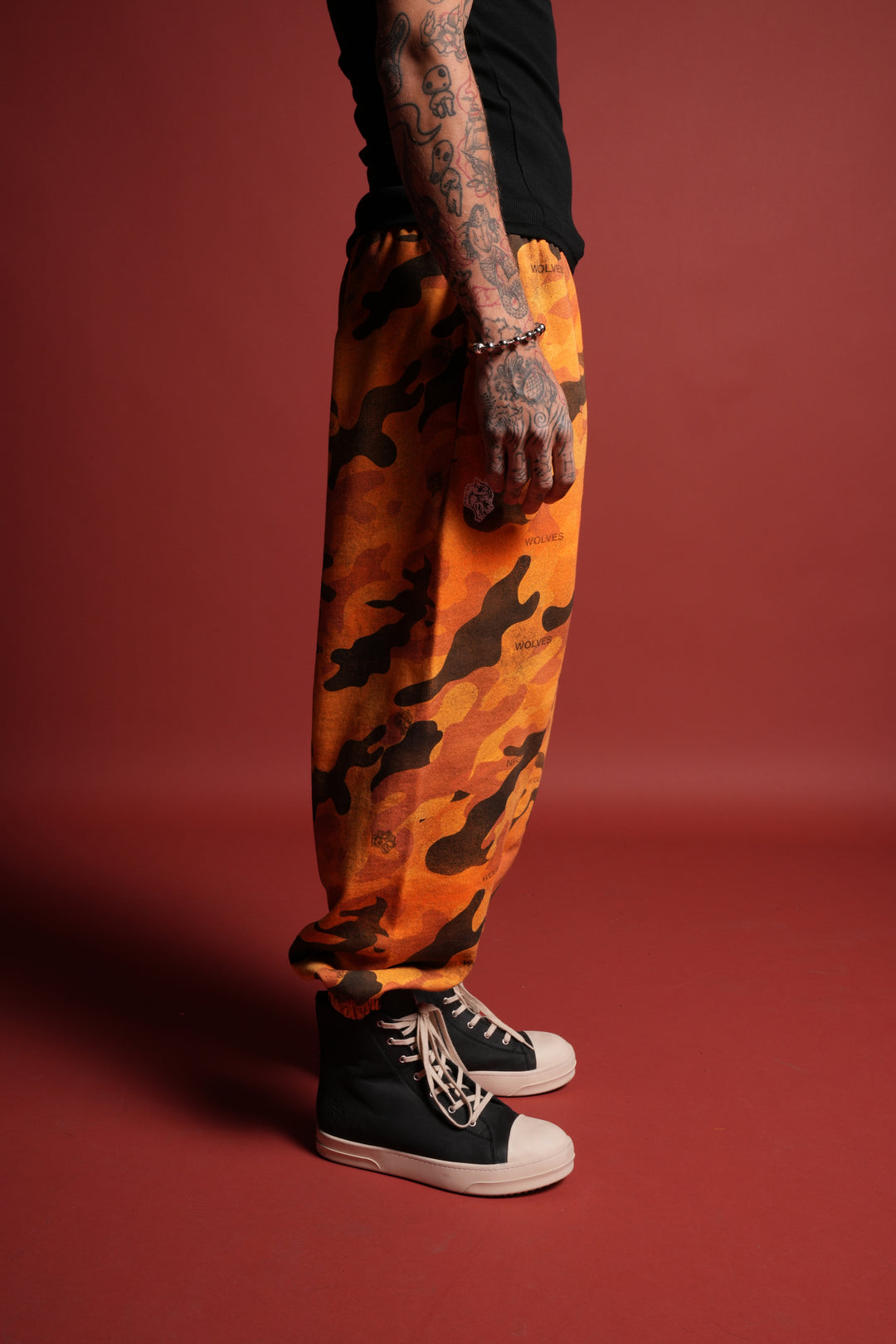 Dual Wolf Unisex Lounger Sweat Pants in DSVD Orange Camo