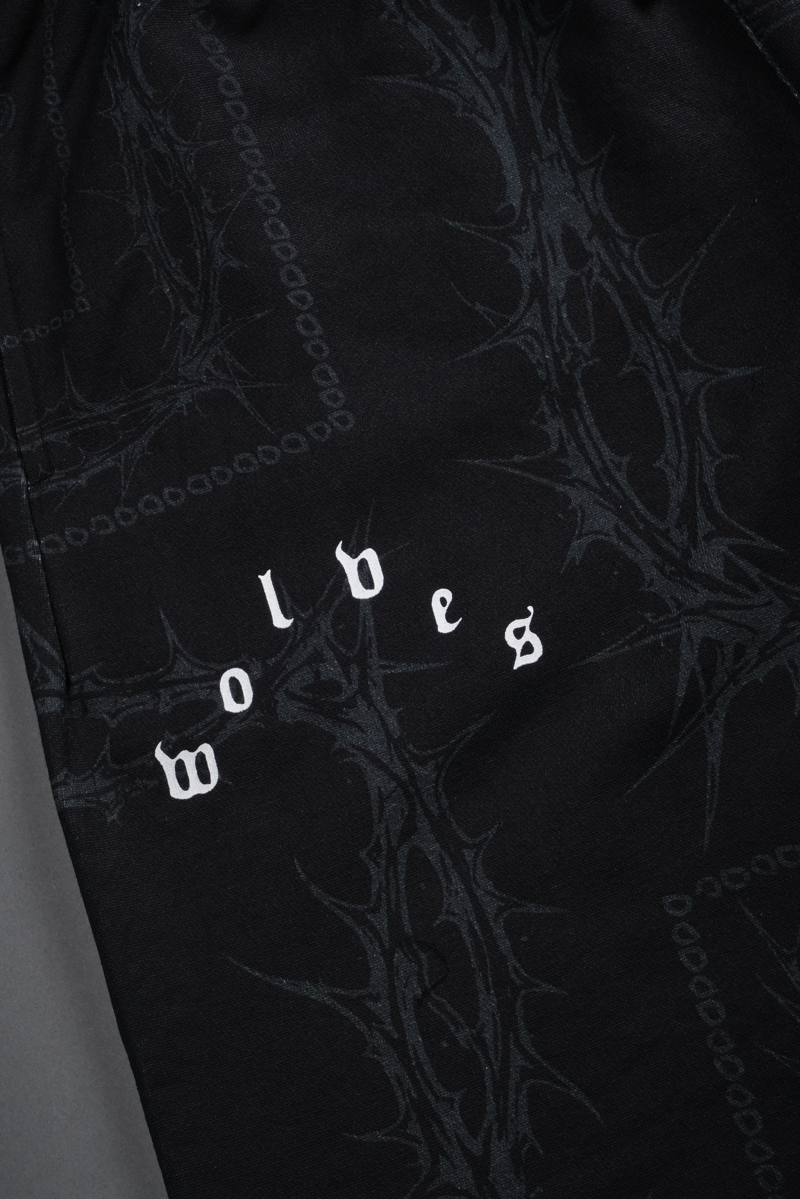 Wolves Pyramid Grunge Oversized Raw Hem Post Lounge Sweat Shorts in Black Thorn Paisley