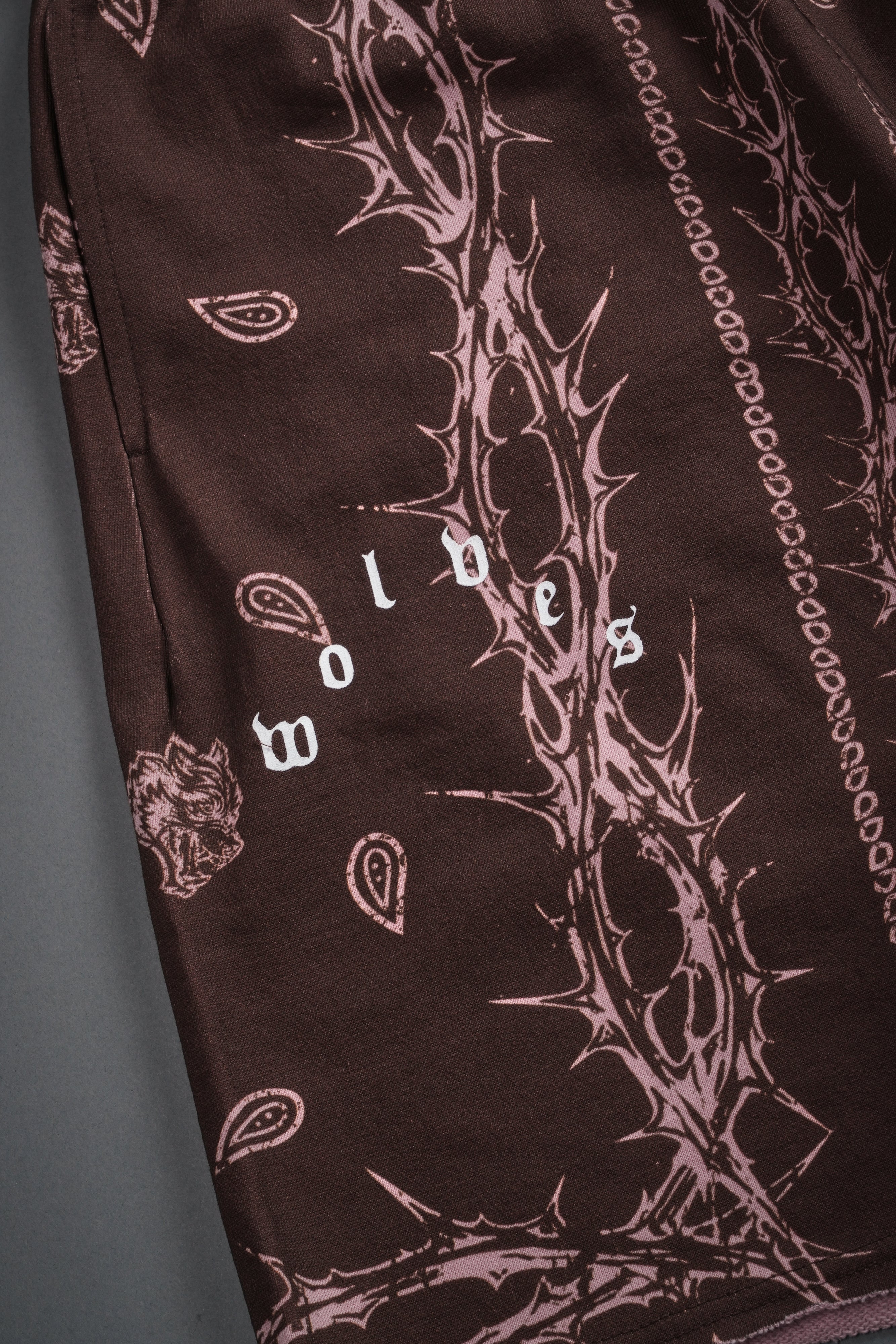 Wolves Pyramid Grunge Oversized Raw Hem Post Lounge Sweat Shorts in Desert Dust Thorn Paisley