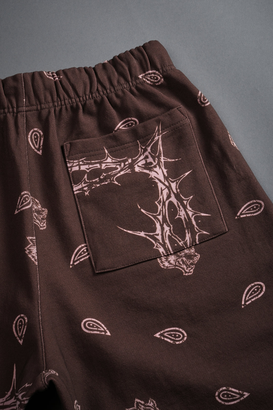 Wolves Pyramid Grunge Oversized Raw Hem Post Lounge Sweat Shorts in Desert Dust Thorn Paisley