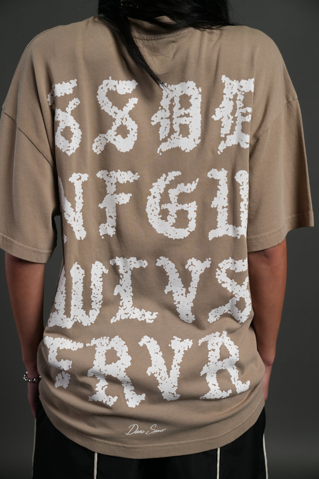 Stone Code "Pump Cover" Tee in Taupe