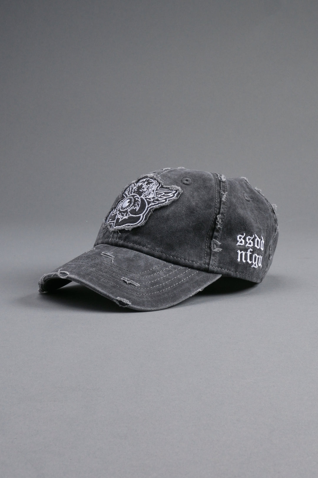 Cherub Eye Ball Distressed Dad Hat in Washed Black