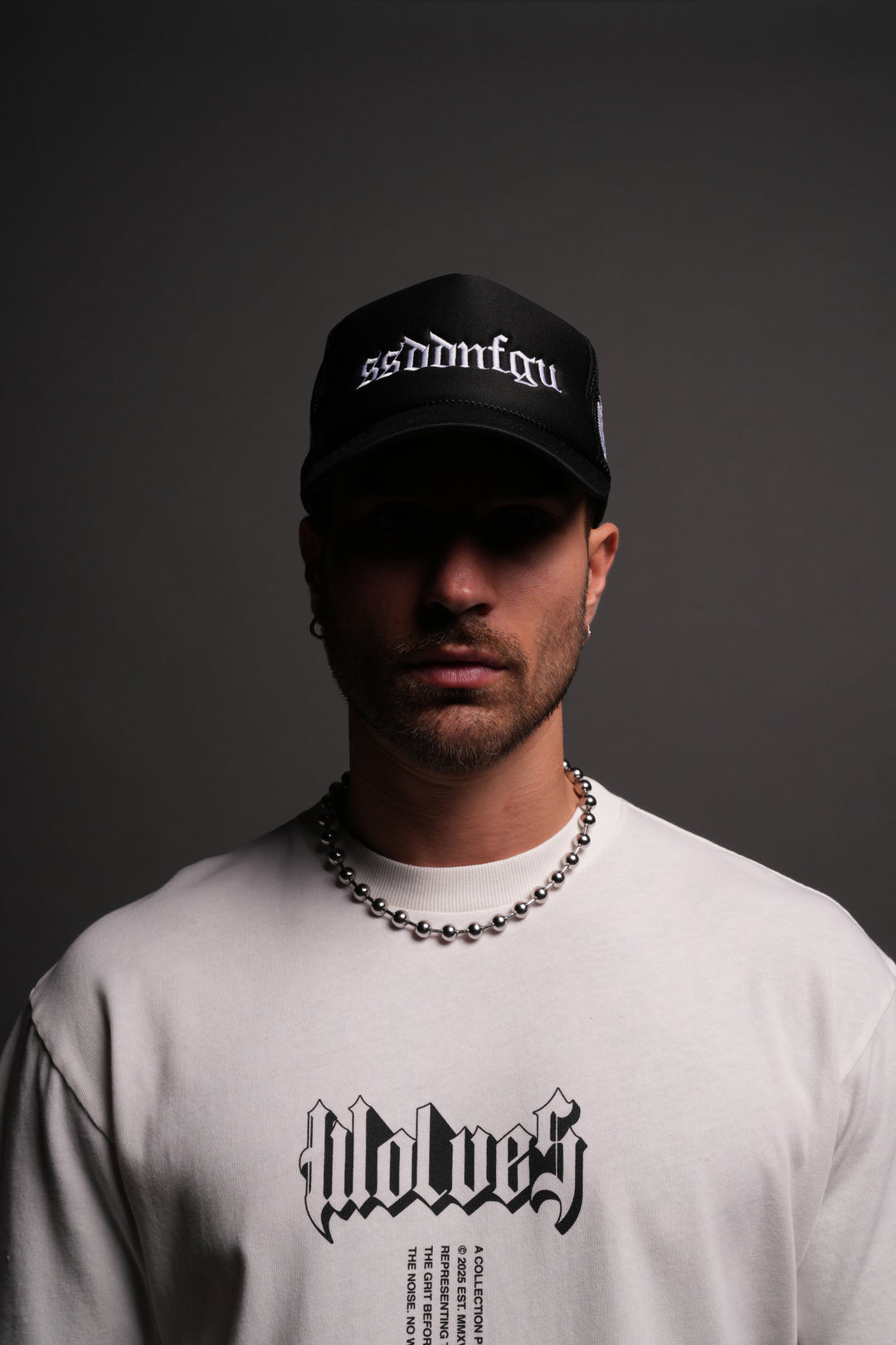 Our Mantra Trucker Hat in Black