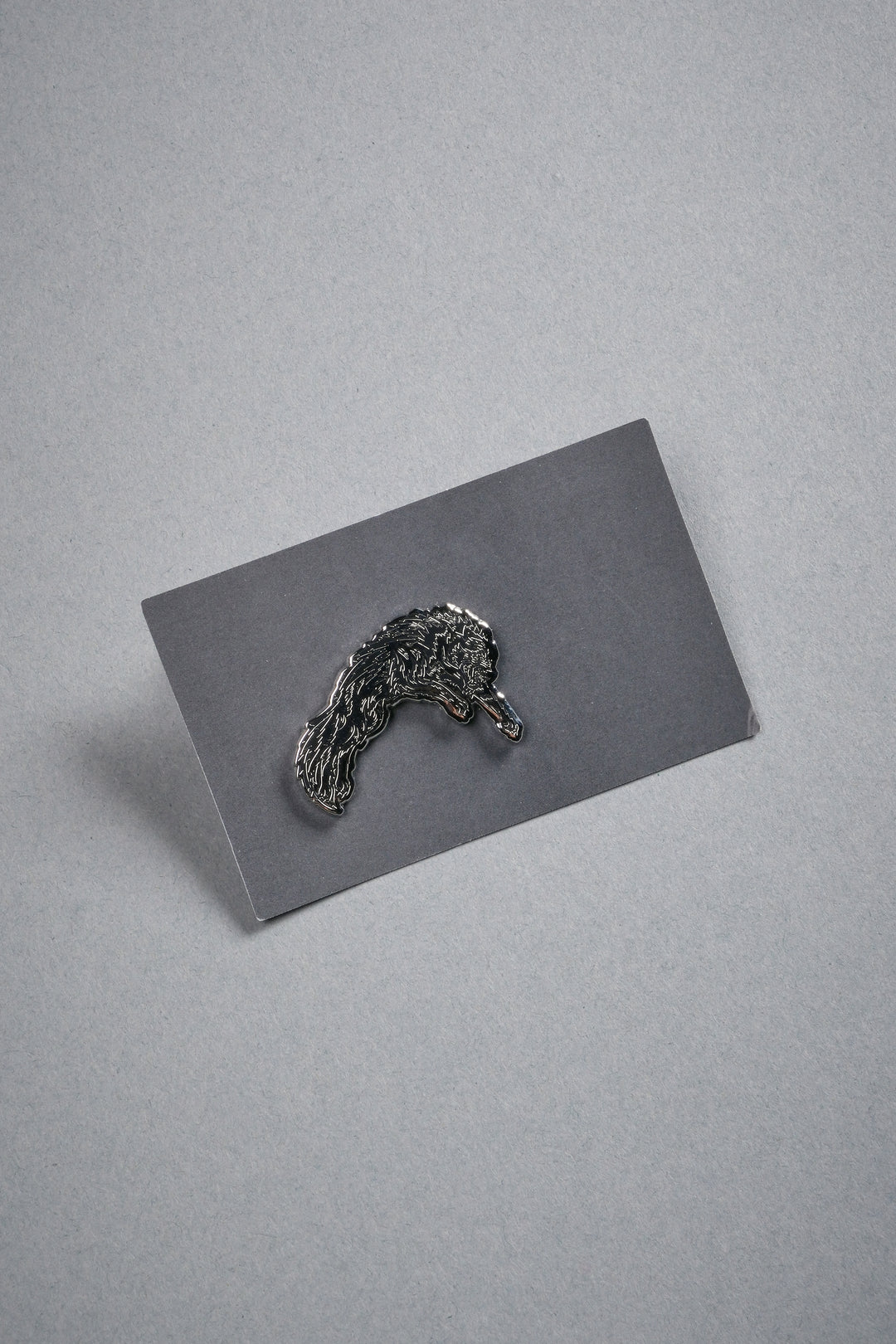Leaping Wolf Enamel Pin in Silver/Black