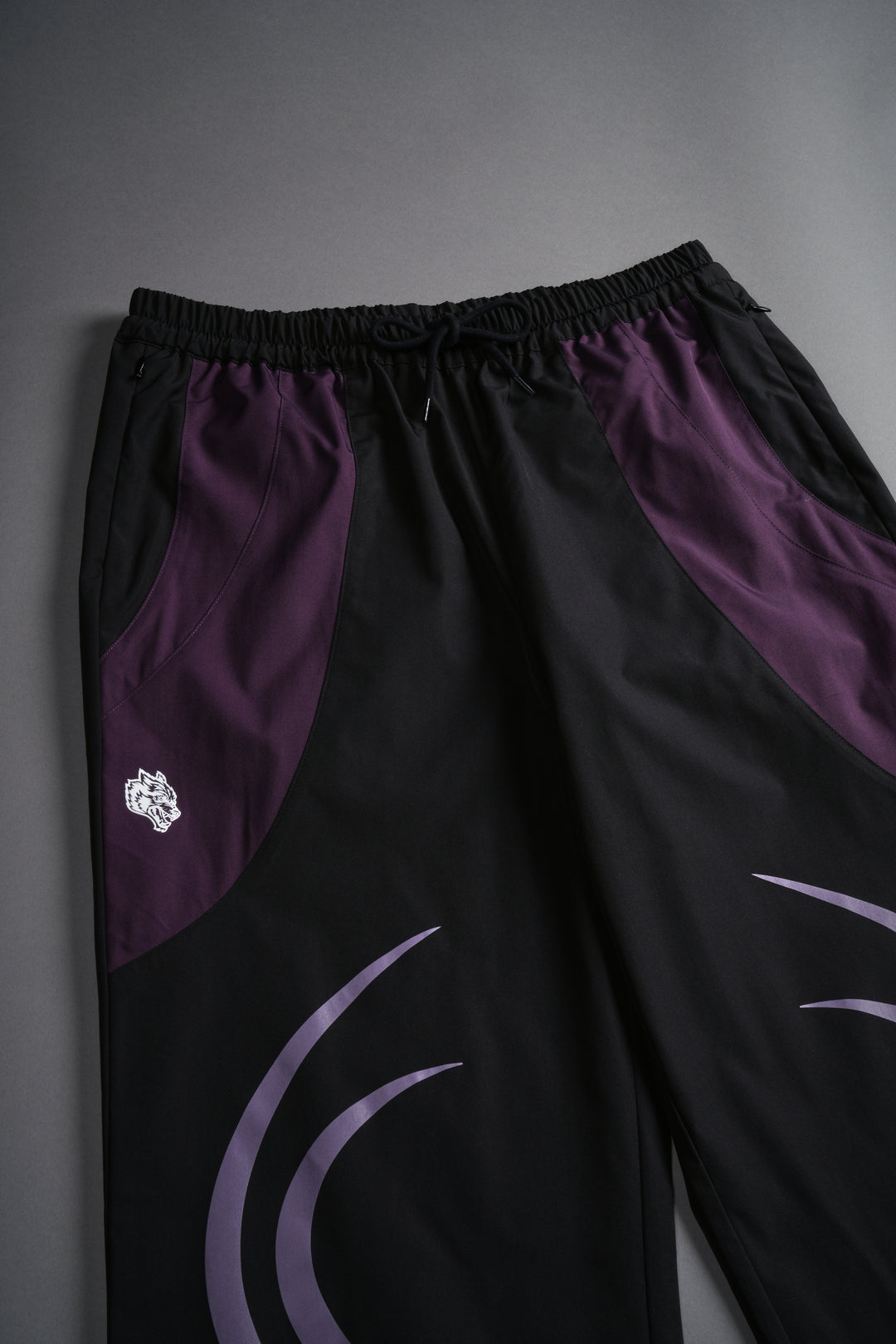 Dual Finite Code She Nadia Track Pants in Black/Phantom Purple