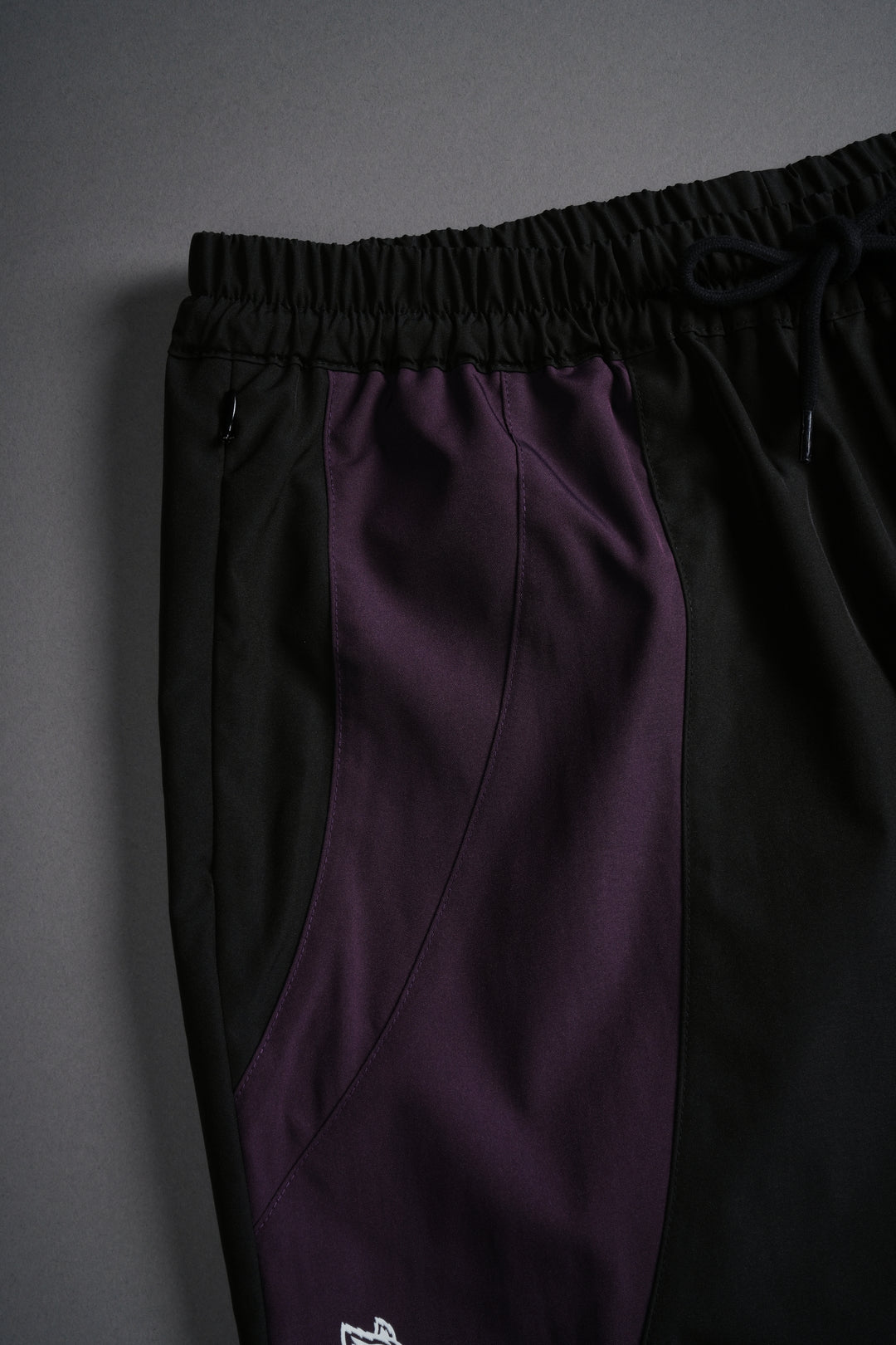 Dual Finite Code She Nadia Track Pants in Black/Phantom Purple