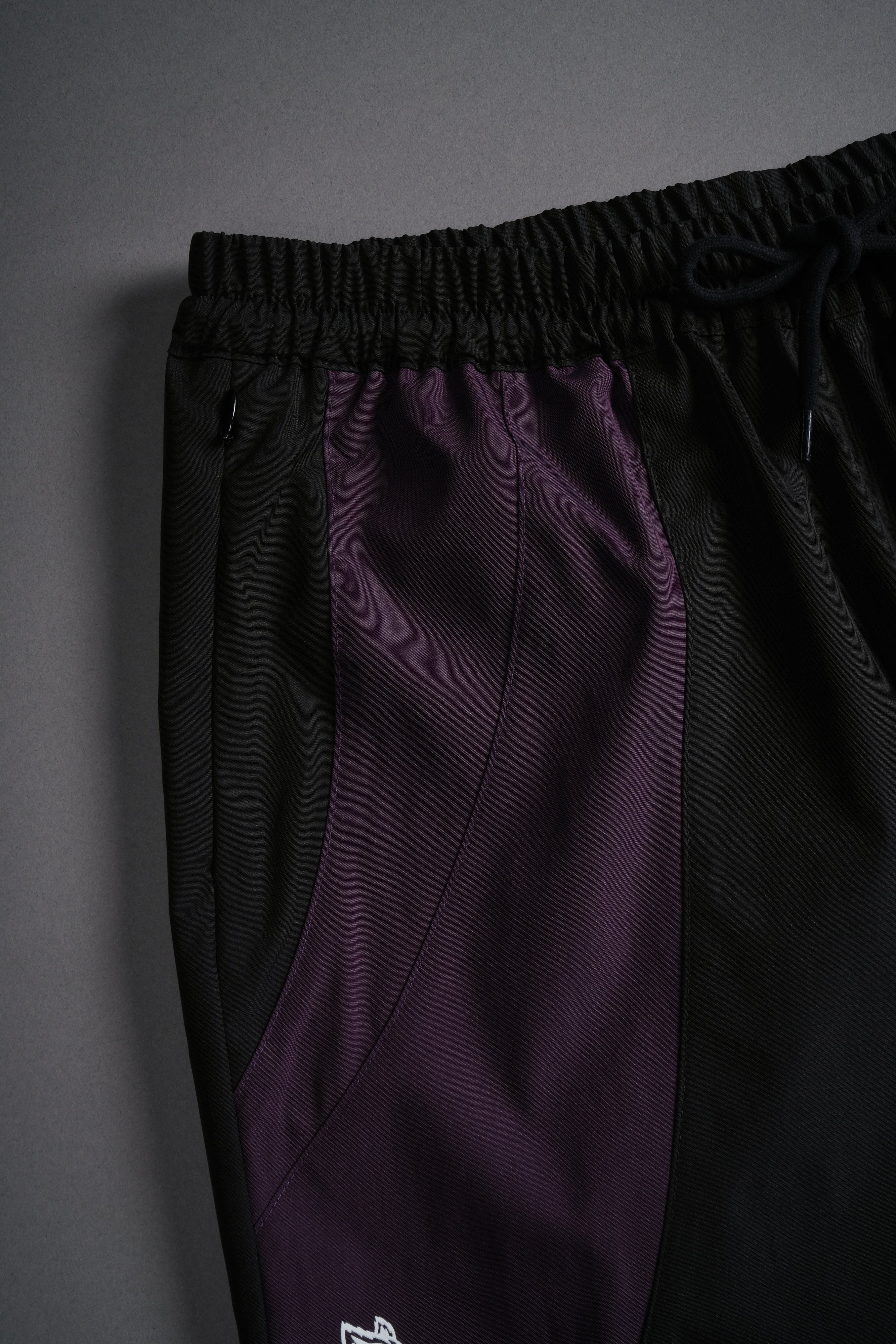 Dual Finite Code She Nadia Track Pants in Black/Phantom Purple