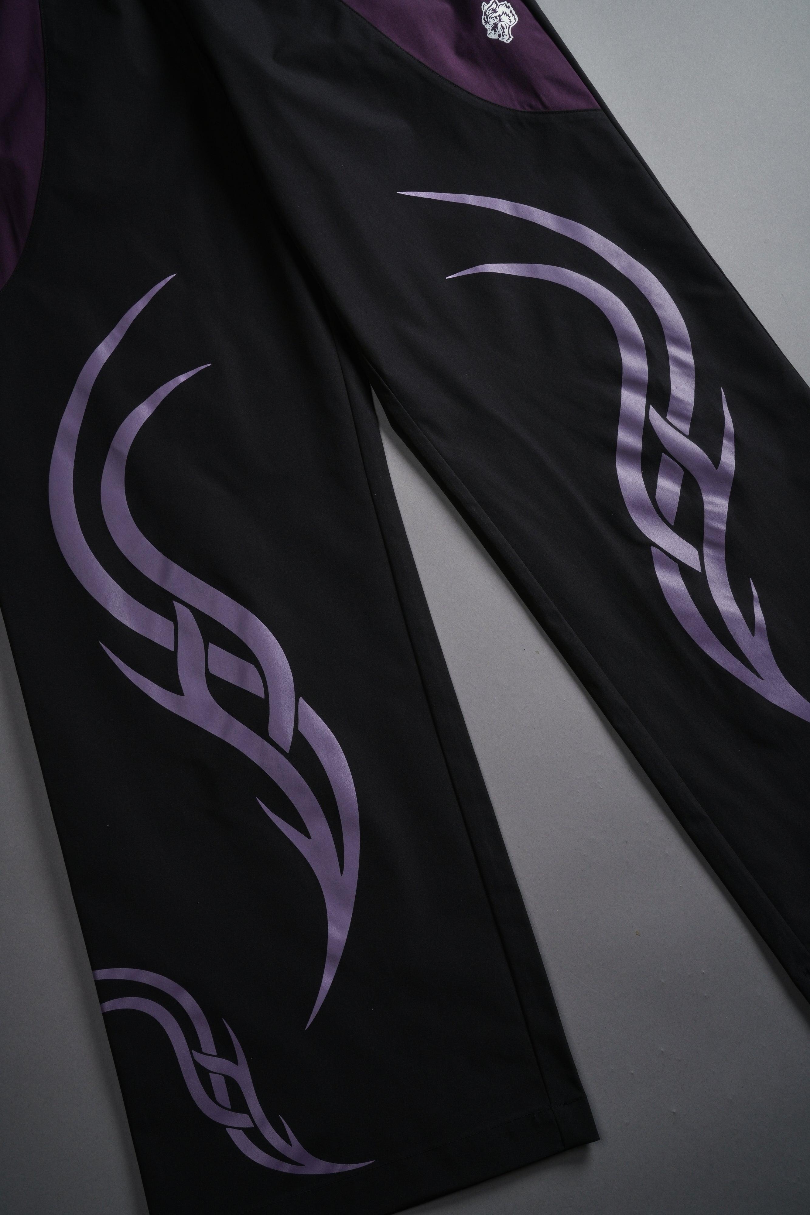 Dual Finite Code She Nadia Track Pants in Black/Phantom Purple