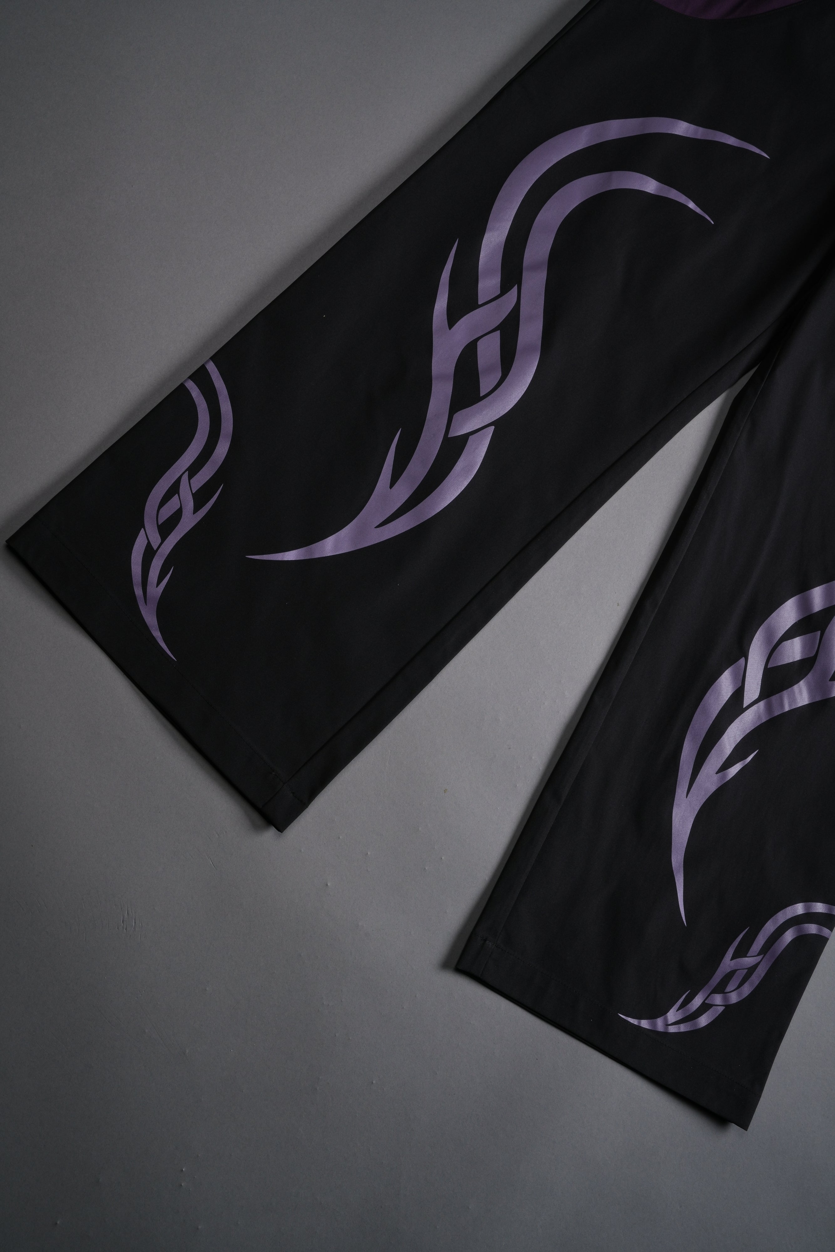 Dual Finite Code She Nadia Track Pants in Black/Phantom Purple