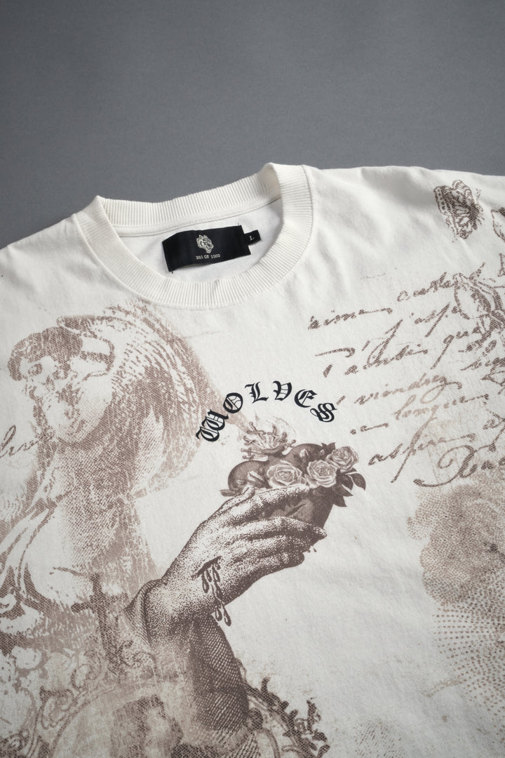 Heart of Thorns Distressed Grunge Cut-Off Mid-Length Raw Hem Tee in Cream