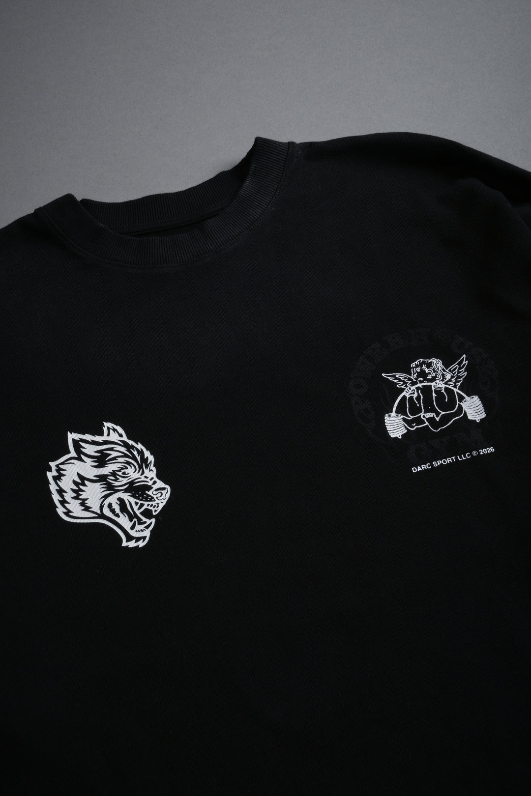Powerhouse of the Cherub Unisex Premium Oversized Tee in Black Drift Wash