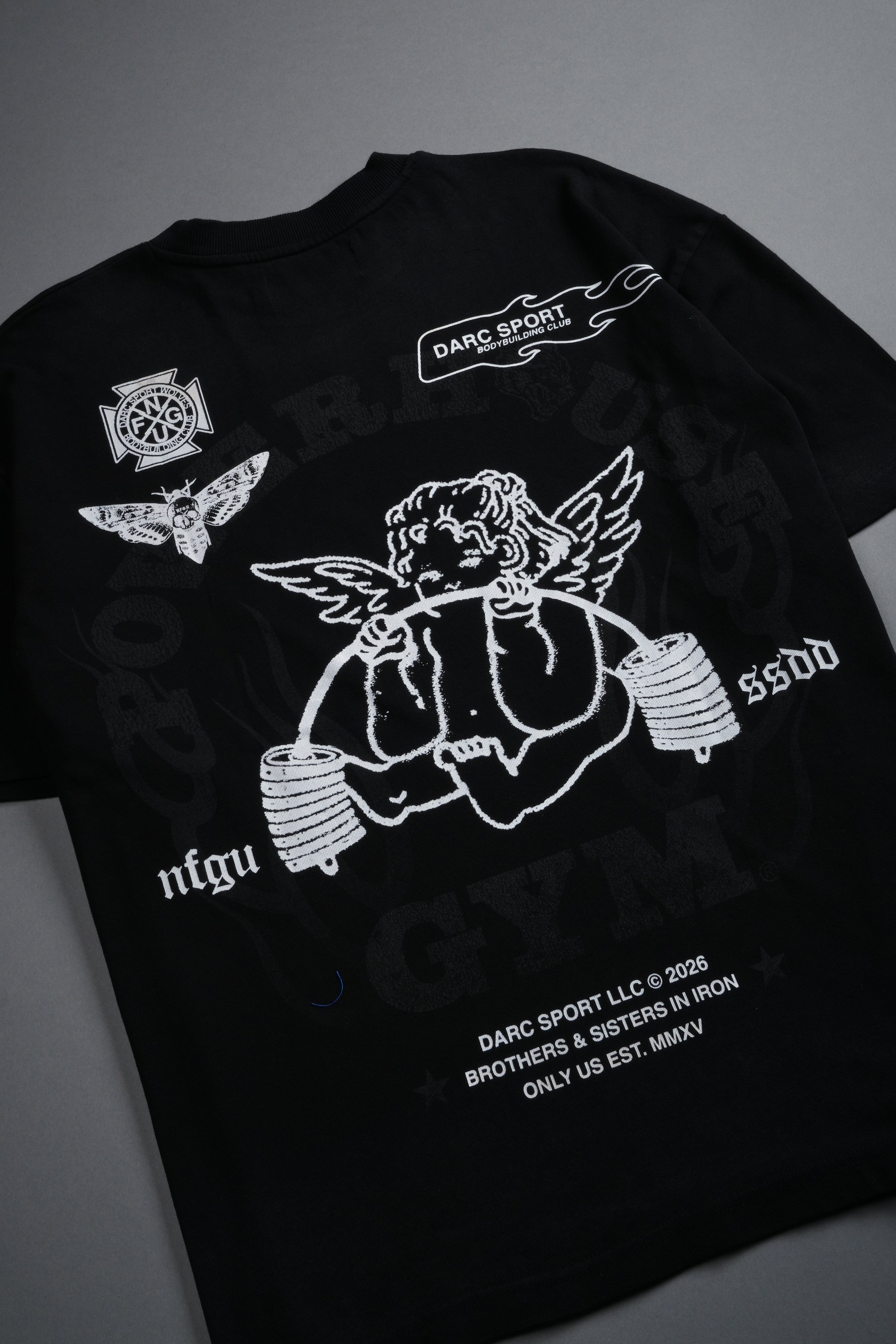 Powerhouse of the Cherub Unisex Premium Oversized Tee in Black Drift Wash
