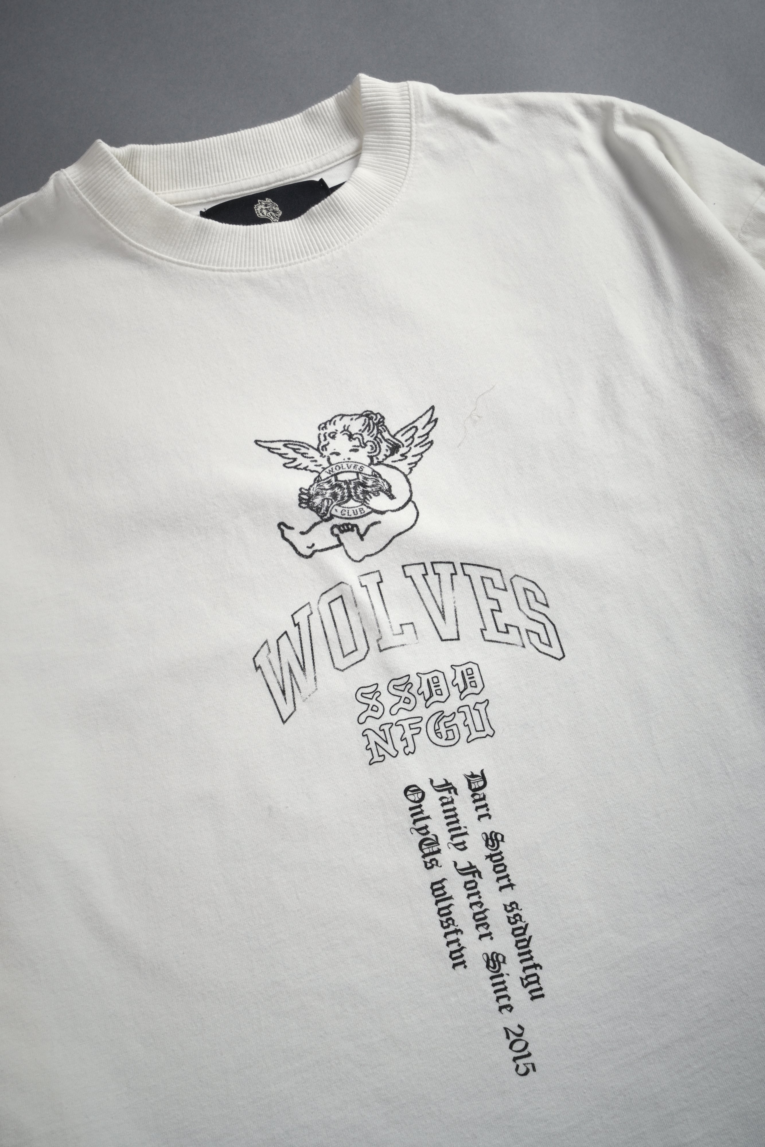 Wolves Club Cherub Grunge Mid Length Raw Hem Tee in Cream