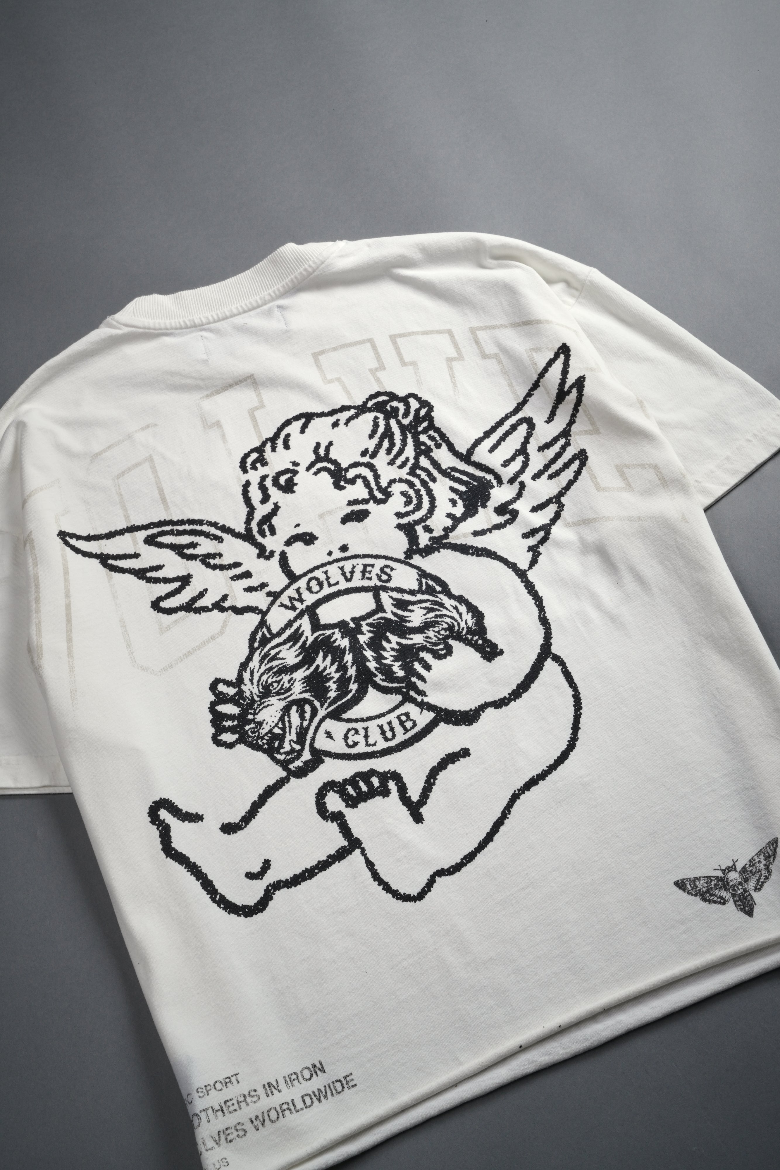 Wolves Club Cherub Grunge Mid Length Raw Hem Tee in Cream