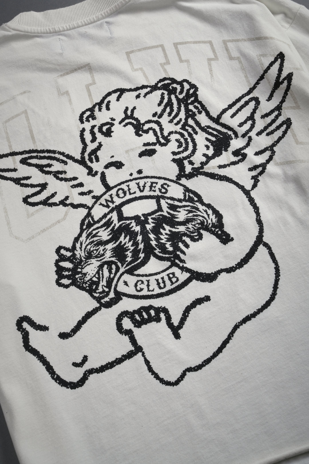 Wolves Club Cherub Grunge Mid Length Raw Hem Tee in Cream