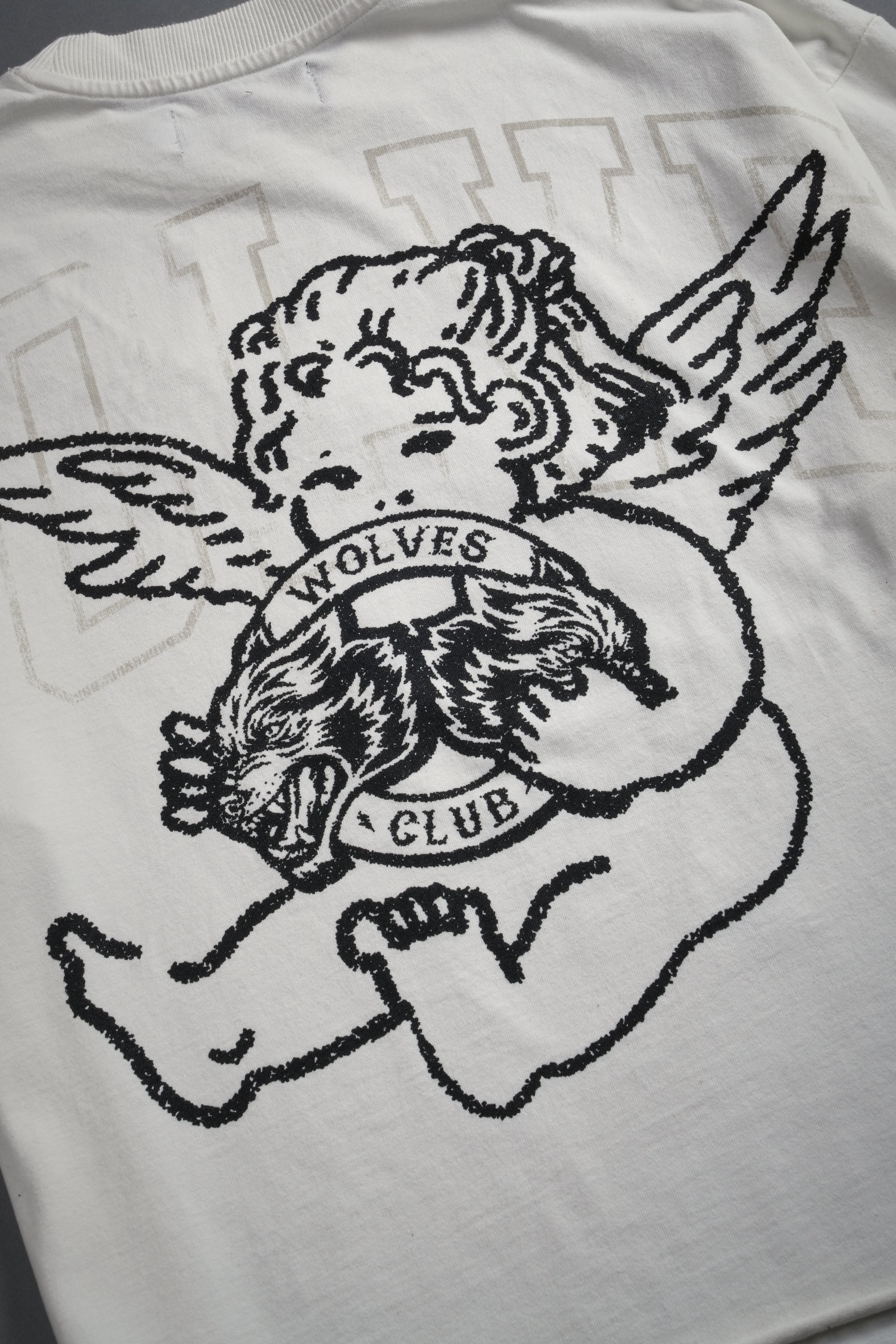 Wolves Club Cherub Grunge Mid Length Raw Hem Tee in Cream