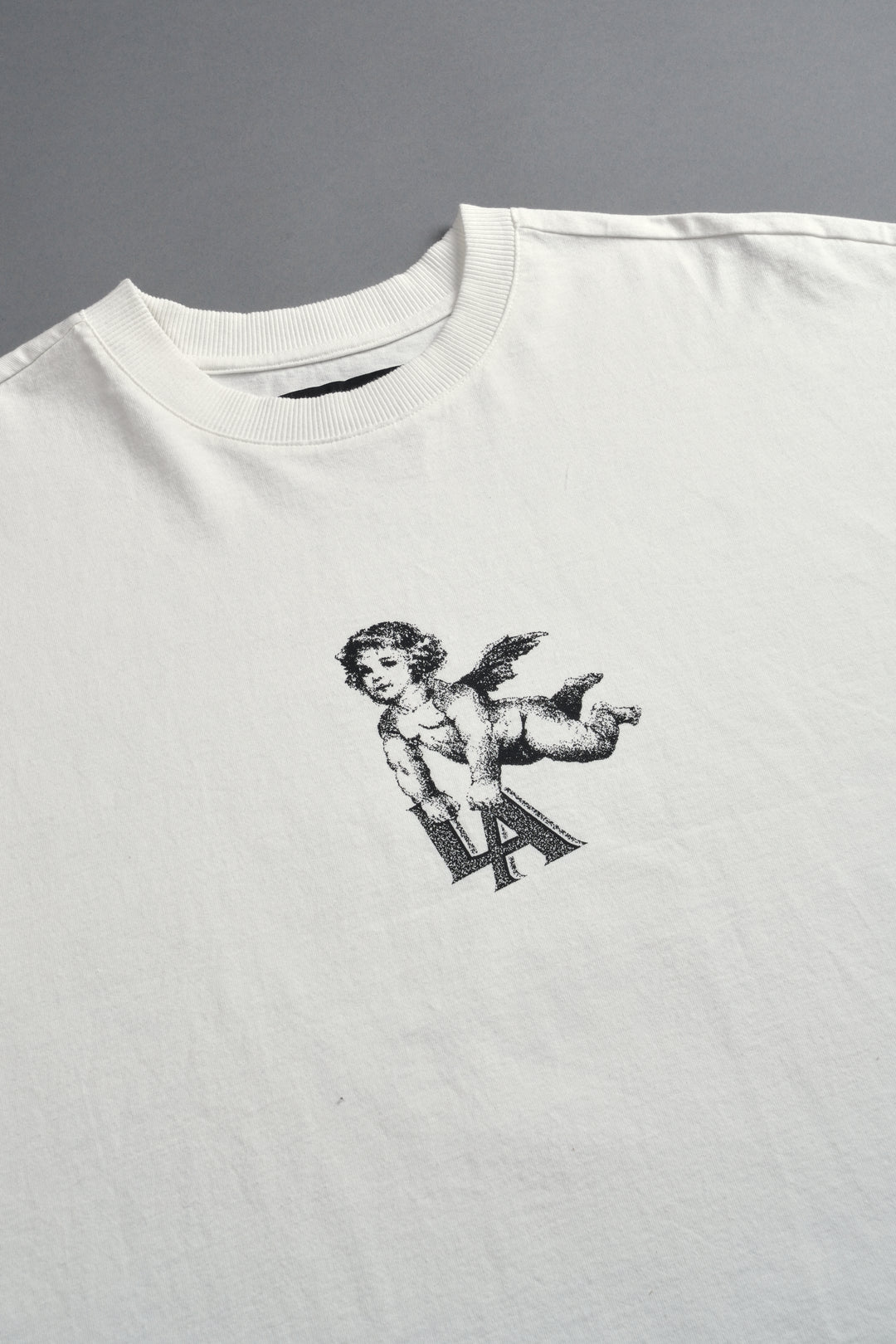 La Cherub Grunge Mid Length Raw Hem Cap Sleeve Tee in Cream