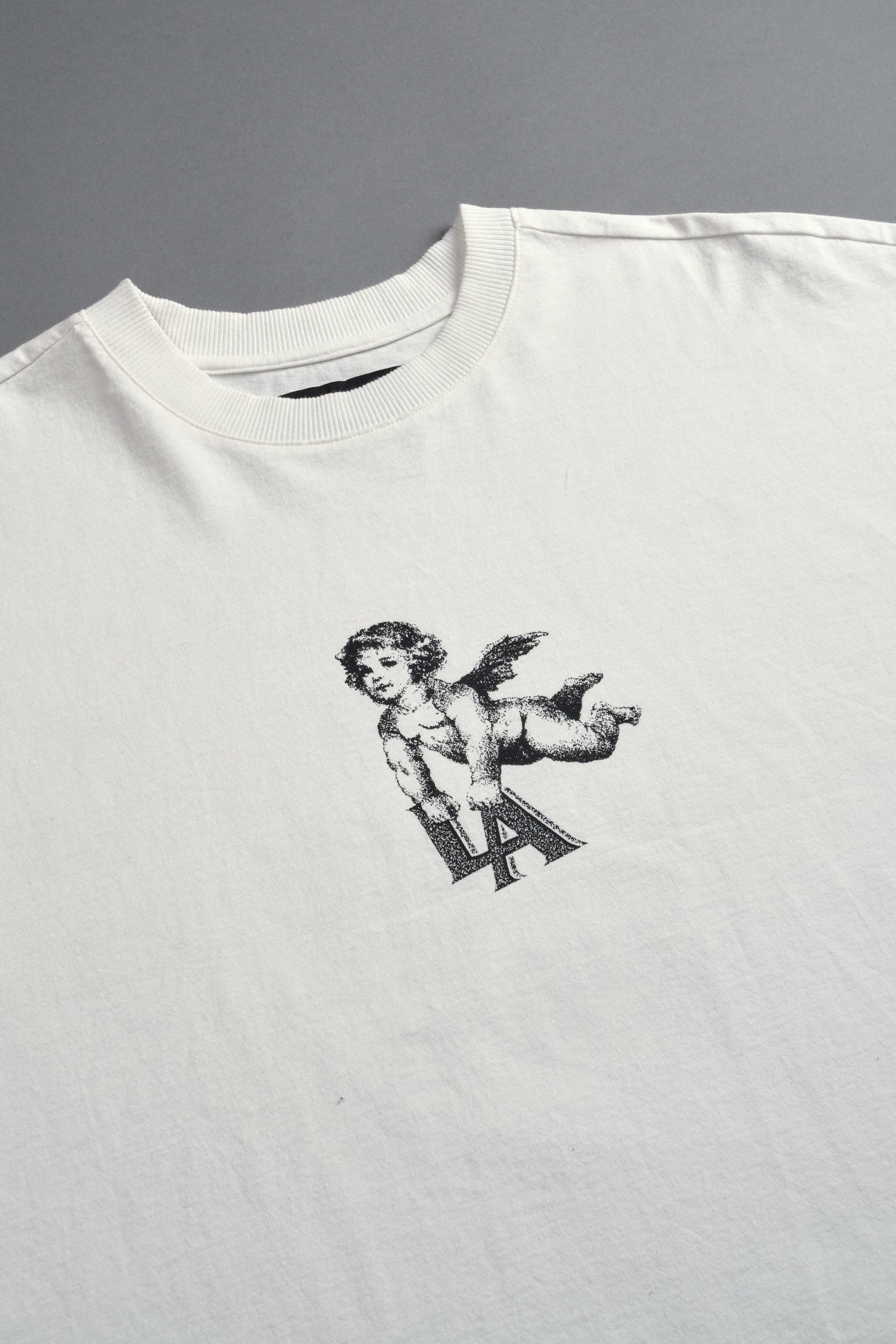 La Cherub Grunge Mid Length Raw Hem Cap Sleeve Tee in Cream