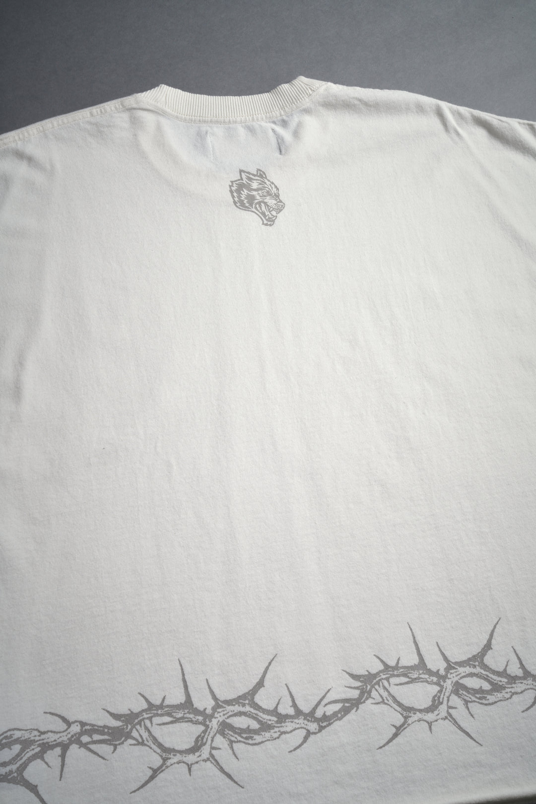 Surrounded by Thorns Grunge Cut-Off Tee in Cream