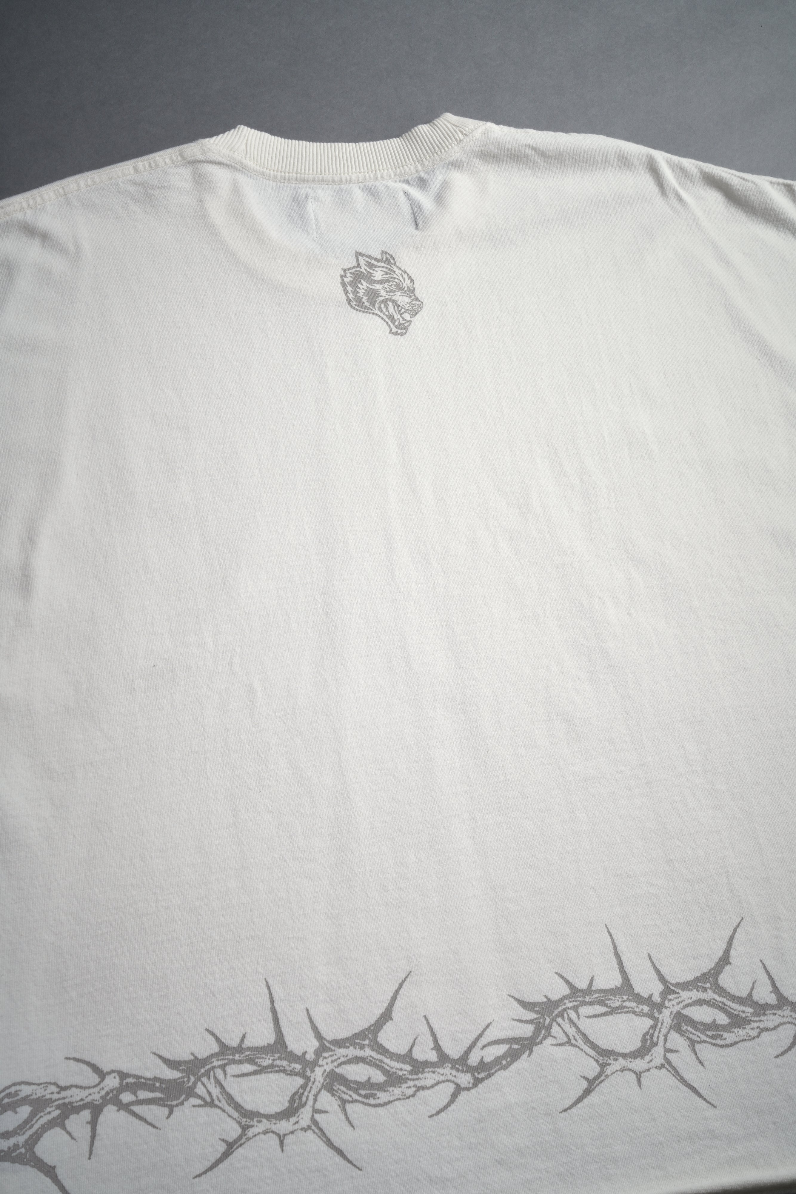 Surrounded by Thorns Grunge Cut-Off Tee in Cream