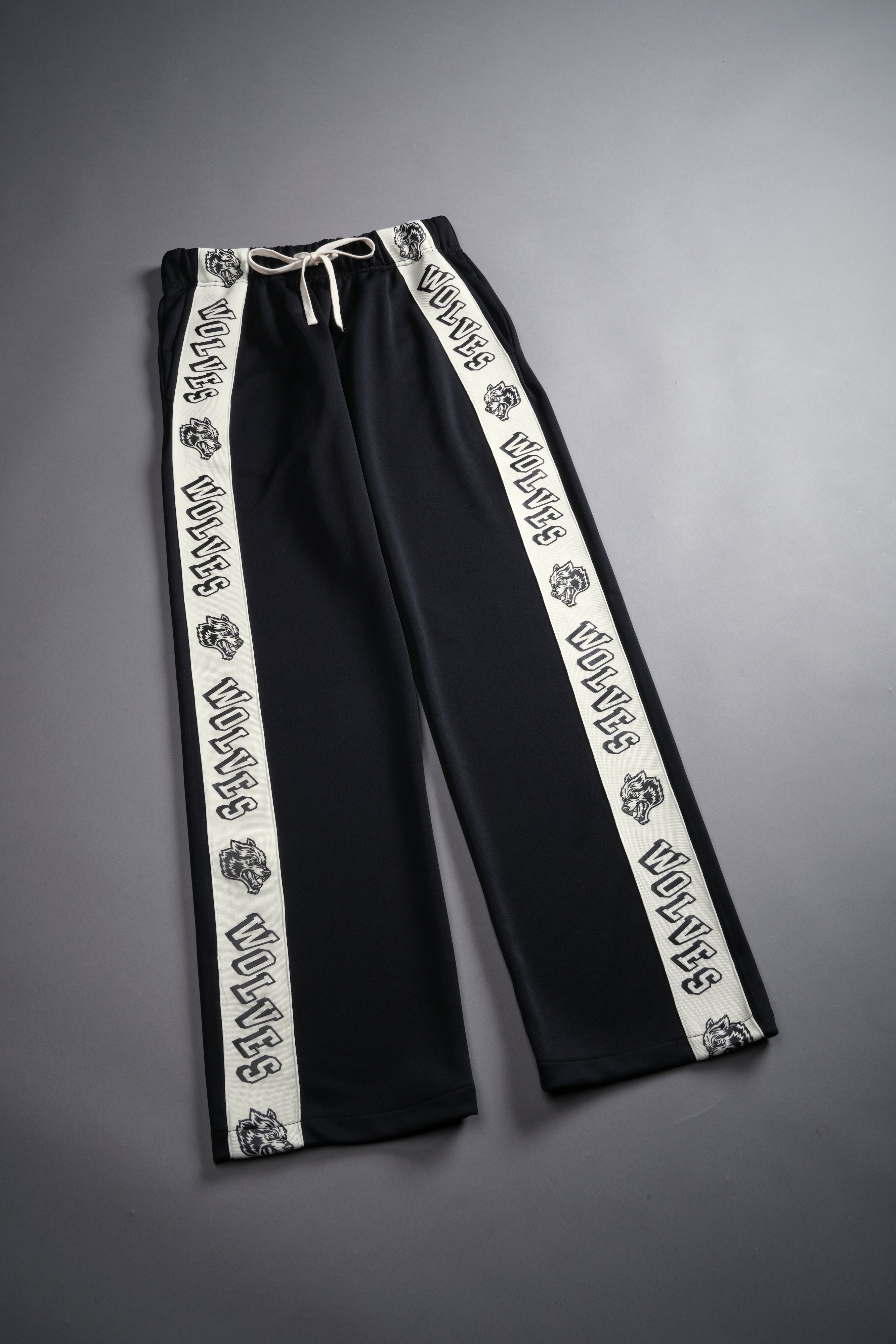 Never Give Up She Roadster Track Pants in Black/Cream