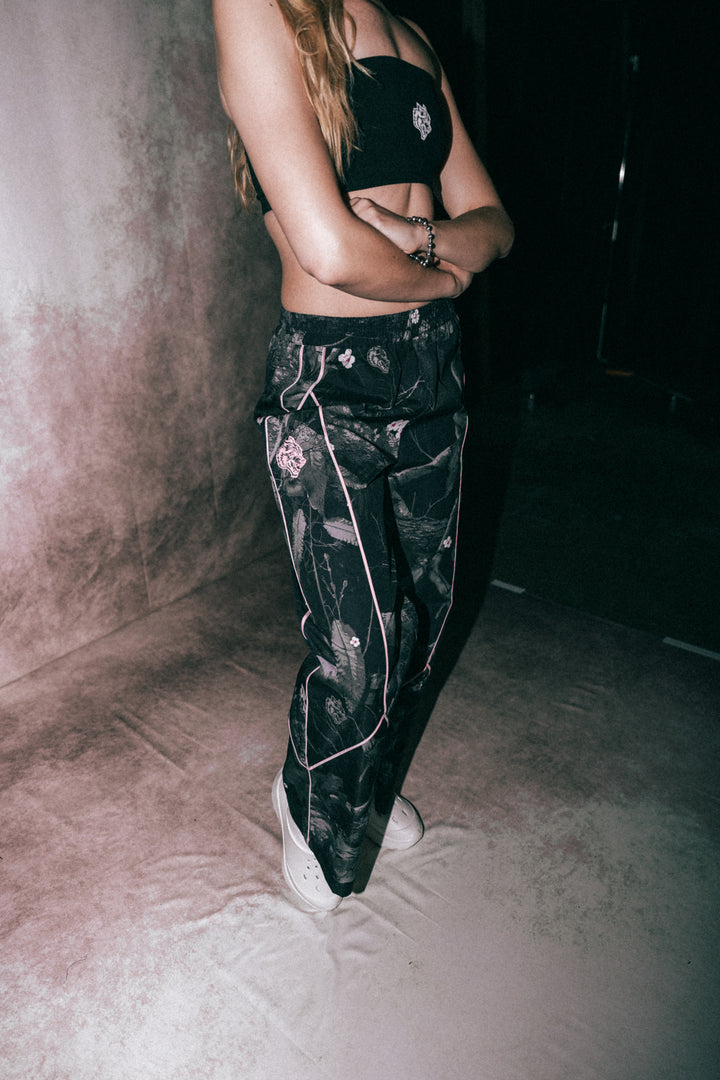 Dual Wolf Quinn Track Pants in Darc Blossom Woodland Camo/Cherry Blossom