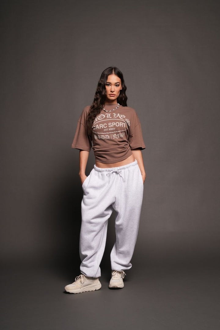 Darc Emblem Pump Cover In Mojave Brown