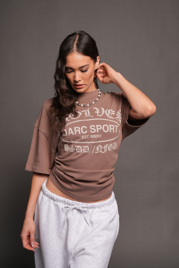 Darc Emblem Pump Cover In Mojave Brown