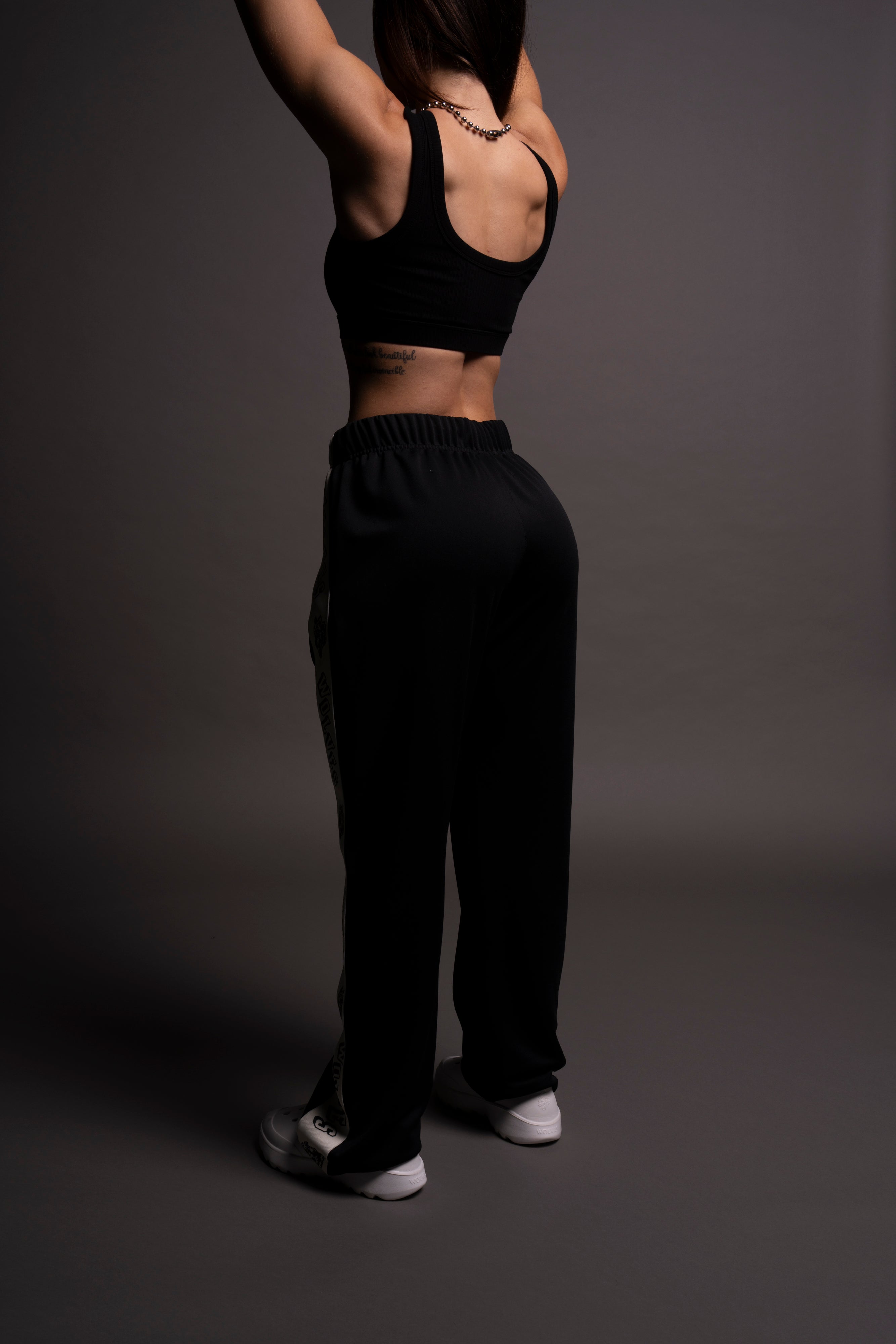 Never Give Up She Roadster Track Pants in Black/Cream