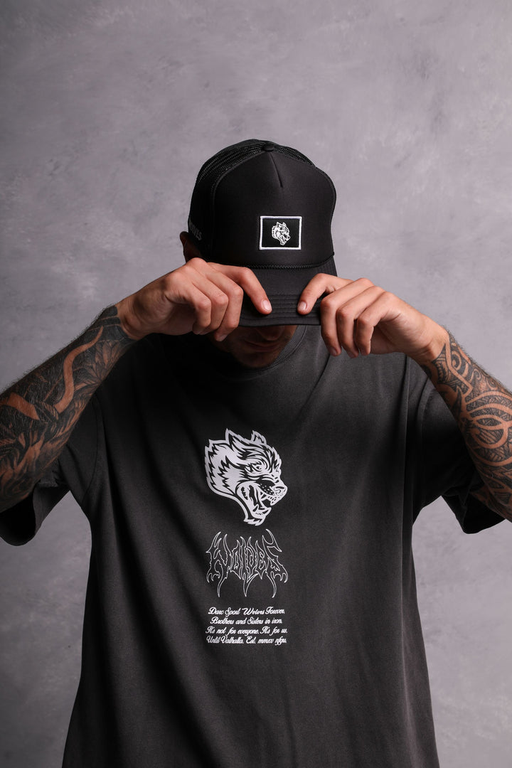 Wolf Patch Trucker Hat in Black