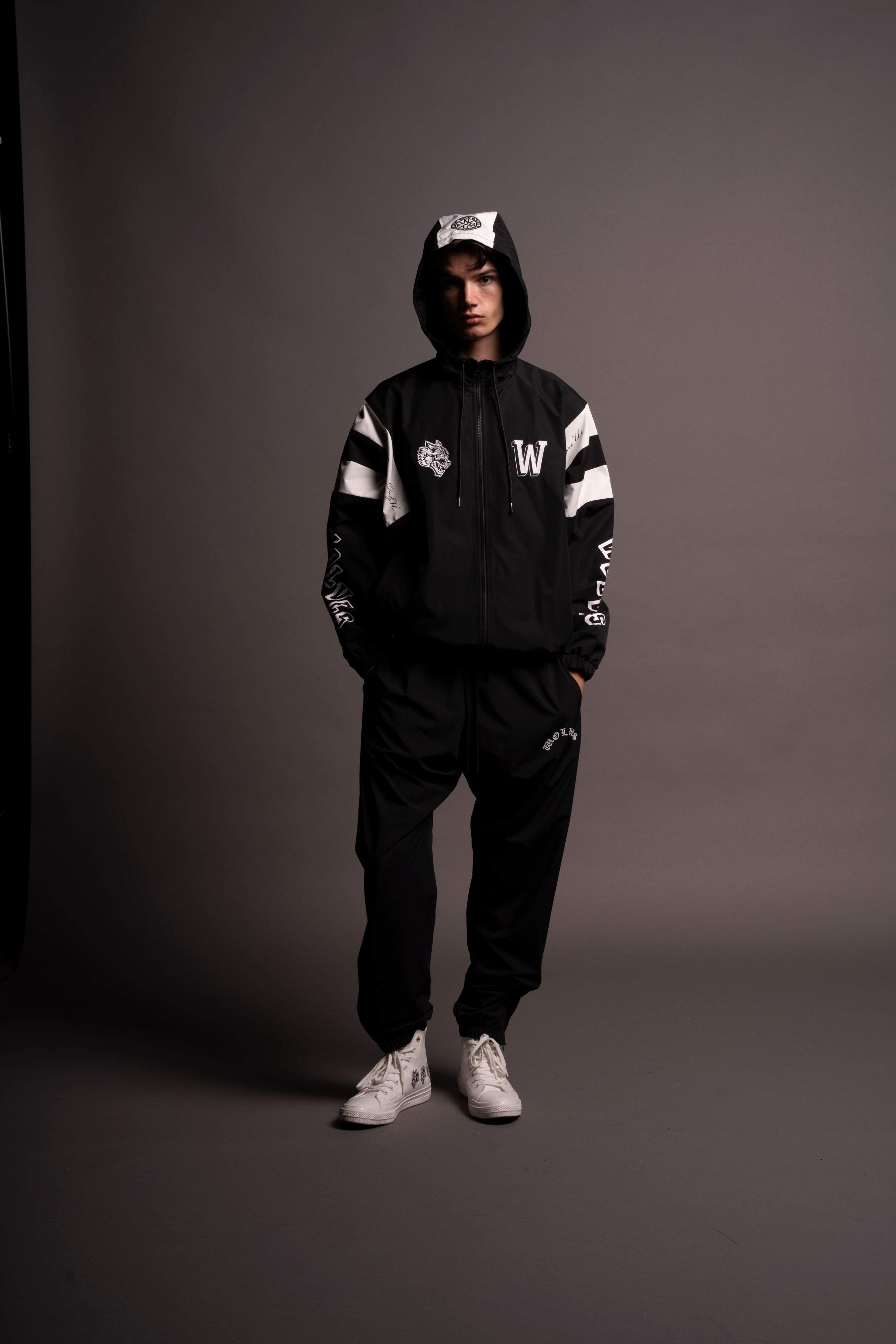 Never Give Up Brolic Unisex Track Jacket in Black/Cream