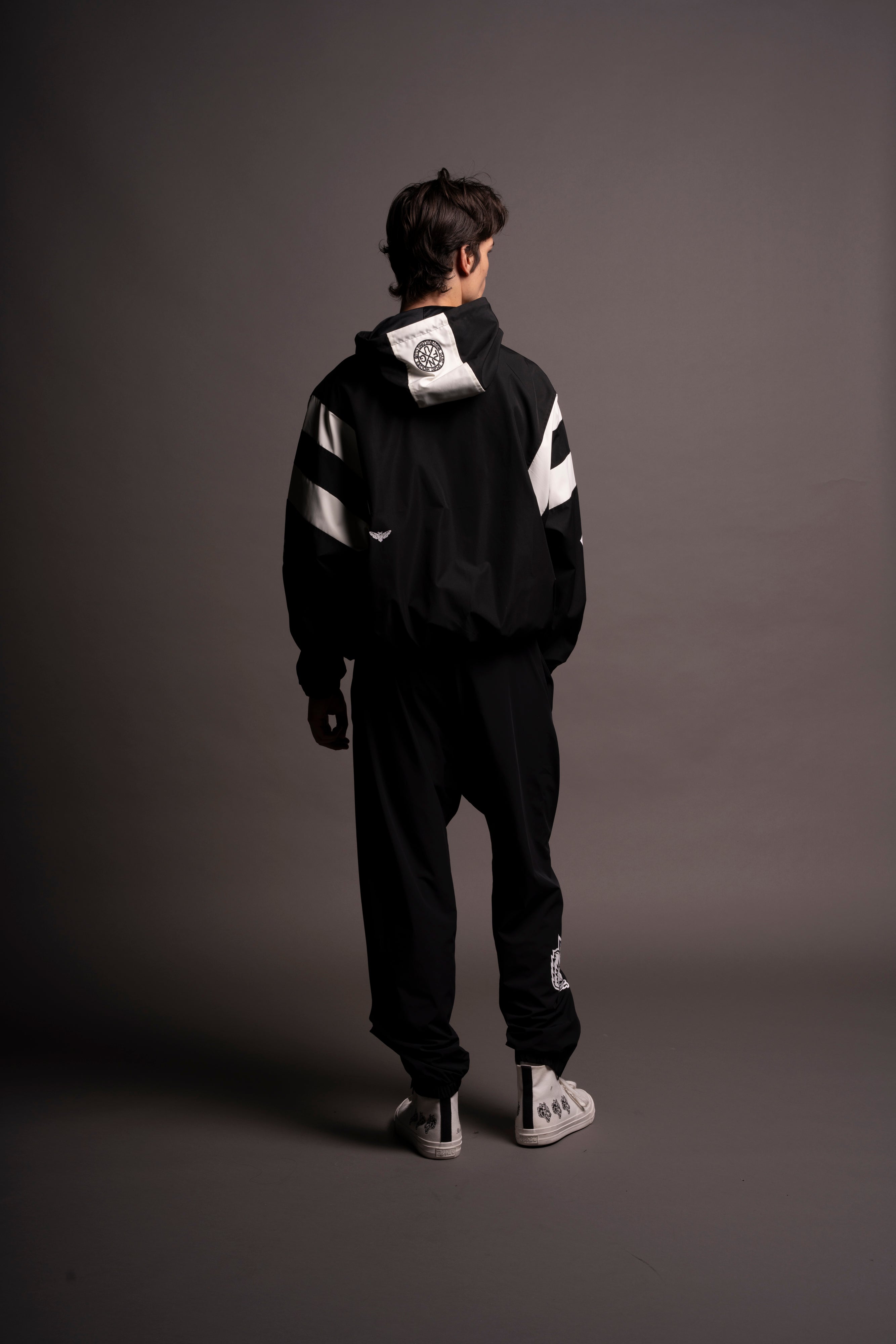 Never Give Up Brolic Unisex Track Jacket in Black/Cream