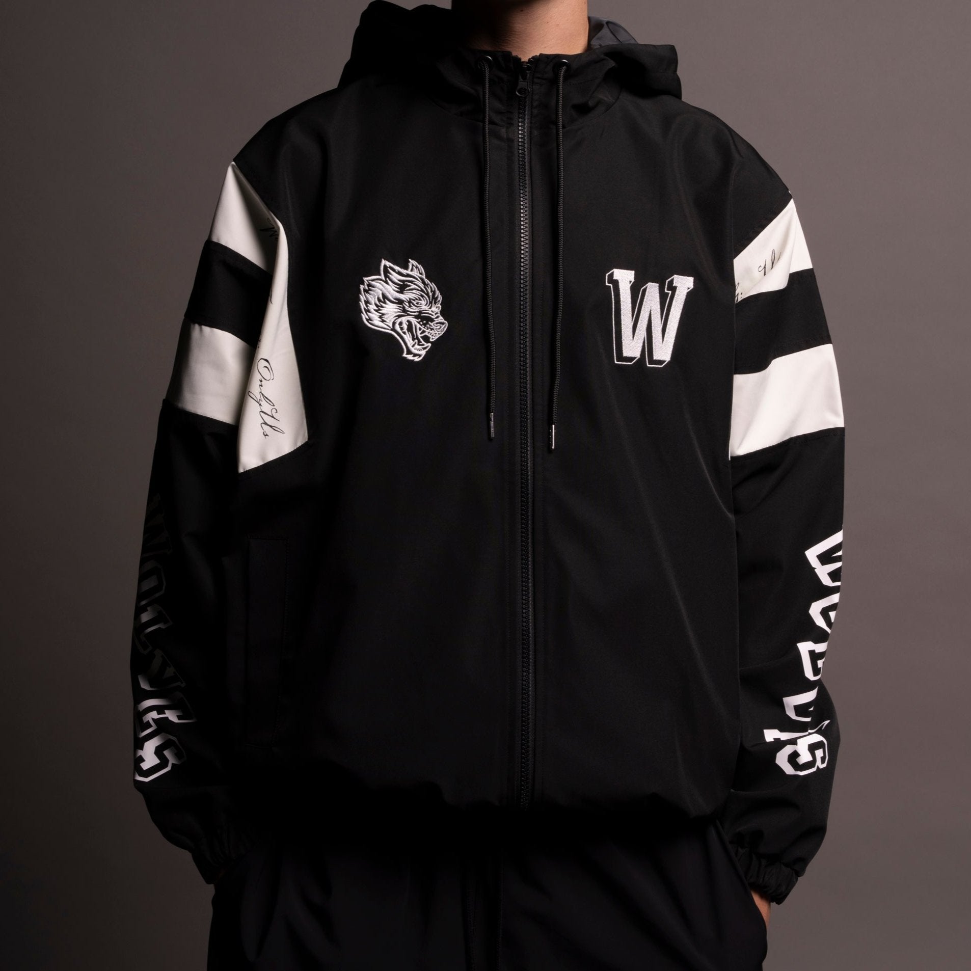 Never Give Up Brolic Unisex Track Jacket in Black/Cream